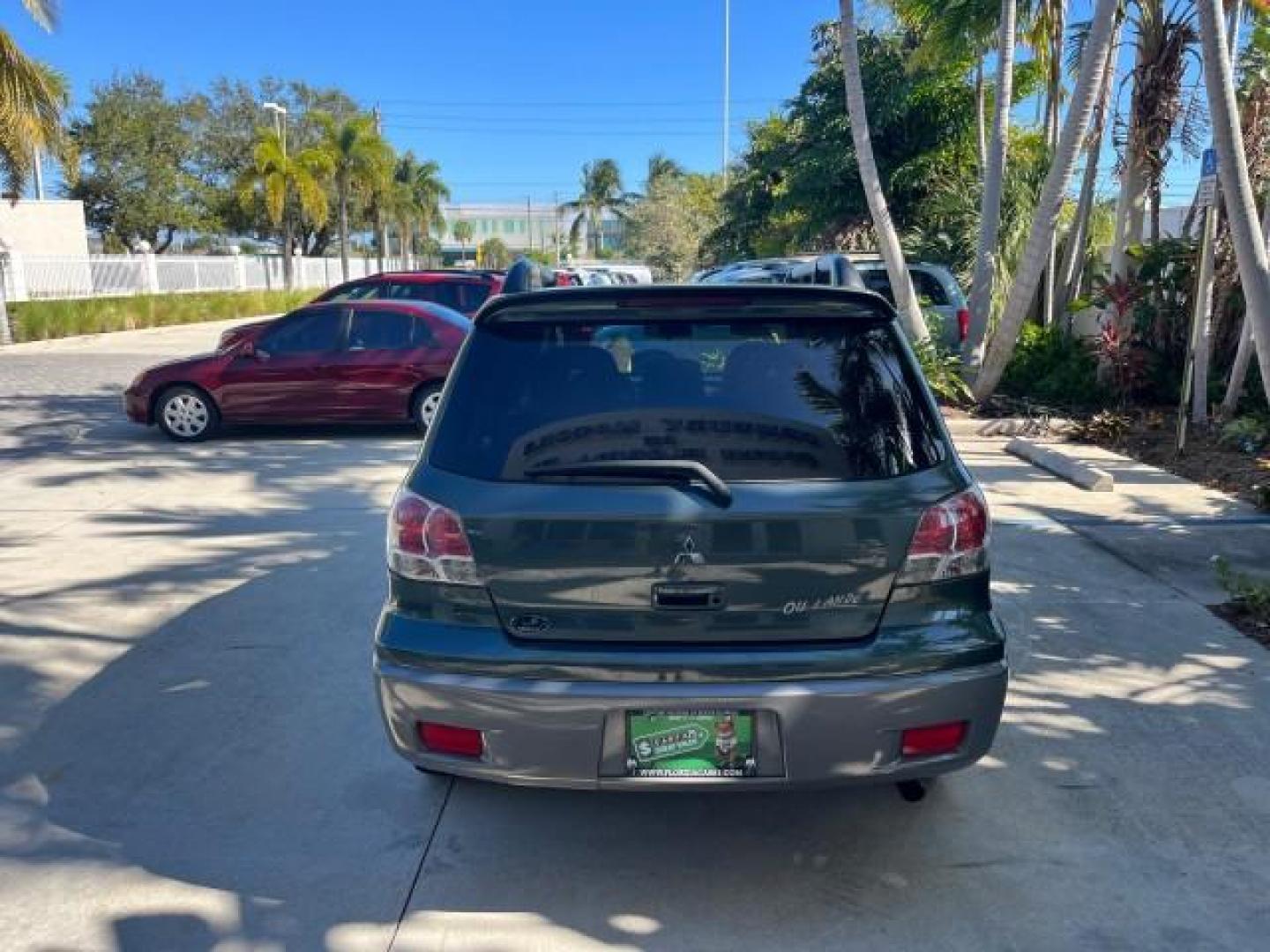 2004 Lofty Green Pearl /Charcoal Mitsubishi Outlander XLS LOW MILES 38,372 (JA4LX41F44U) with an 2.4L SOHC SMPI 16-Valve I4 Engine engine, Automatic transmission, located at 4701 North Dixie Hwy, Pompano Beach, FL, 33064, (954) 422-2889, 26.240938, -80.123474 - OUR WEBPAGE FLORIDACARS1.COM HAS OVER 100 PHOTOS AND FREE CARFAX LINK 2004 MITSUBISHI OUTLANDER XLS ROAD READY 2.4L I4 VIN: JA4LX41F44U045177 NO ACCIDENTS 27 MPG DOOR WAGON/SPORT UTILITY NO RECALLS 2.4L I4 F SOHC FLORIDA OWNER GASOLINE LOW MILES 38,372 FRONT WHEEL DRIVE 10 SERVICE RECORDS Alloy Whee - Photo#6