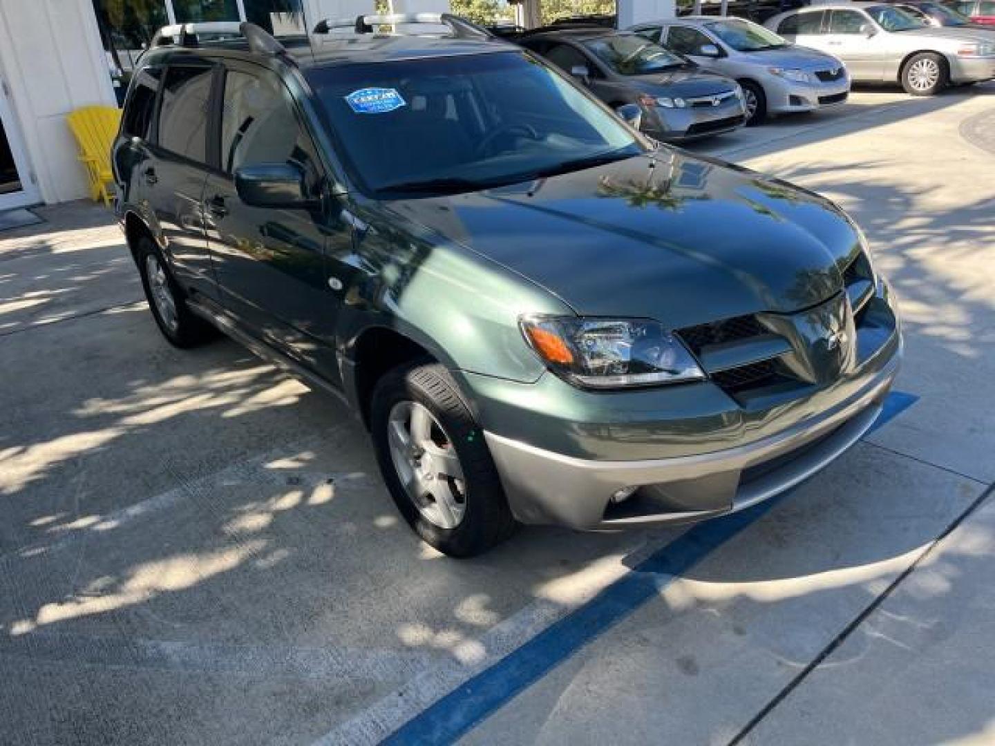 2004 Lofty Green Pearl /Charcoal Mitsubishi Outlander XLS LOW MILES 38,372 (JA4LX41F44U) with an 2.4L SOHC SMPI 16-Valve I4 Engine engine, Automatic transmission, located at 4701 North Dixie Hwy, Pompano Beach, FL, 33064, (954) 422-2889, 26.240938, -80.123474 - OUR WEBPAGE FLORIDACARS1.COM HAS OVER 100 PHOTOS AND FREE CARFAX LINK 2004 MITSUBISHI OUTLANDER XLS ROAD READY 2.4L I4 VIN: JA4LX41F44U045177 NO ACCIDENTS 27 MPG DOOR WAGON/SPORT UTILITY NO RECALLS 2.4L I4 F SOHC FLORIDA OWNER GASOLINE LOW MILES 38,372 FRONT WHEEL DRIVE 10 SERVICE RECORDS Alloy Whee - Photo#77