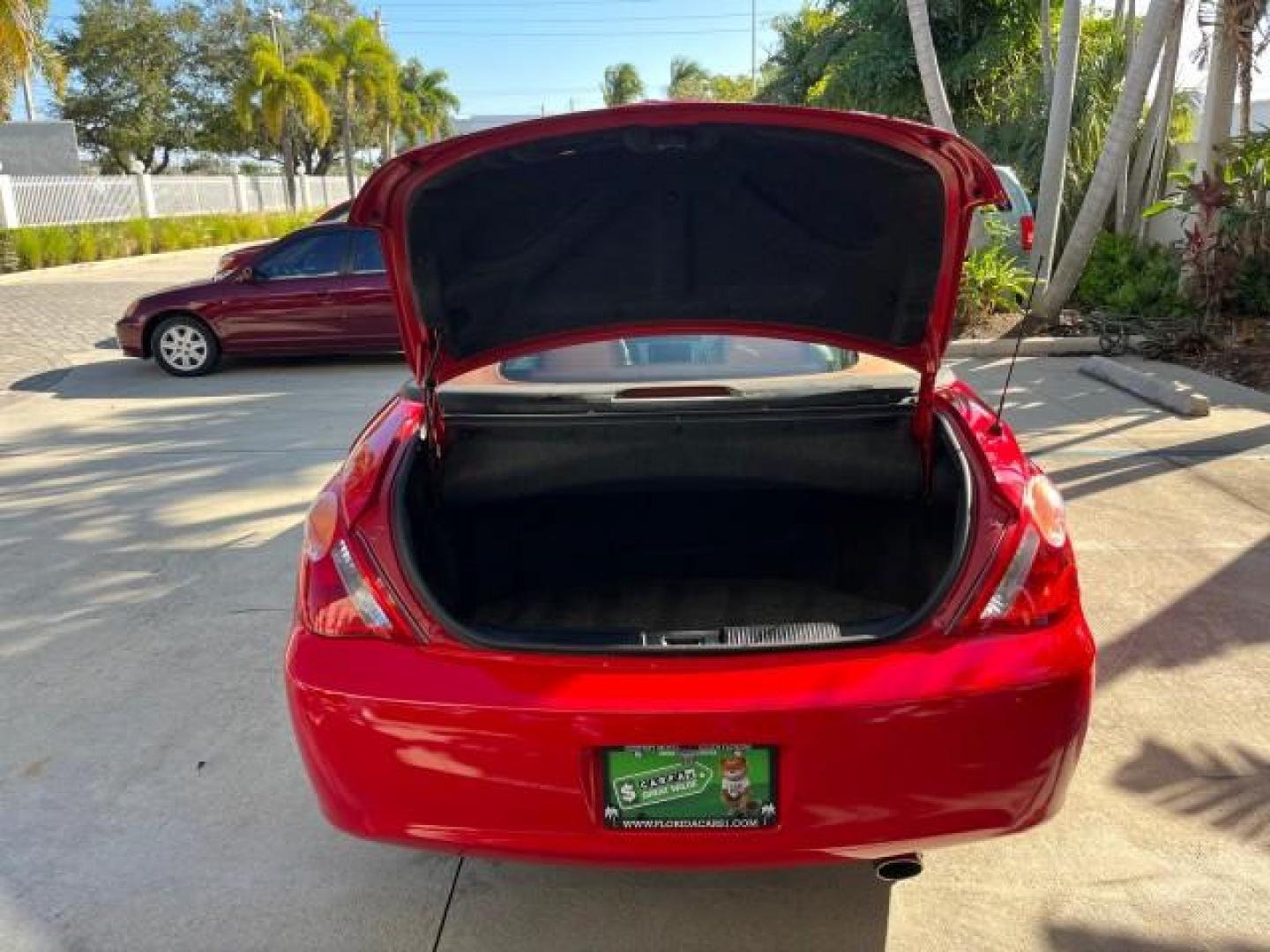 2005 Absolutely Red /Ivory Toyota Camry Solara SLE LOW MILES 45,207 (4T1FA38P45U) with an 3.3L DOHC SEFI VVT-i 24-Valve V6 Engine engine, Automatic transmission, located at 4701 North Dixie Hwy, Pompano Beach, FL, 33064, (954) 422-2889, 26.240938, -80.123474 - OUR WEBPAGE FLORIDACARS1.COM HAS OVER 100 PHOTOS AND FREE CARFAX LINK 2005 TOYOTA CAMRY SOLARA SE V6 ROAD READY 3.3L V6 VIN: 4T1FA38P45U047960 NO ACCIDENTS 29 MPG CONVERTIBLE NO RECALLS 3.3L V6 F DOHC 24V BACK UP CAMERA FLORIDA OWNER GASOLINE NAVIGATION LOW MILES 45,207 FRONT WHEEL DRIVE POWER LEATH - Photo#49