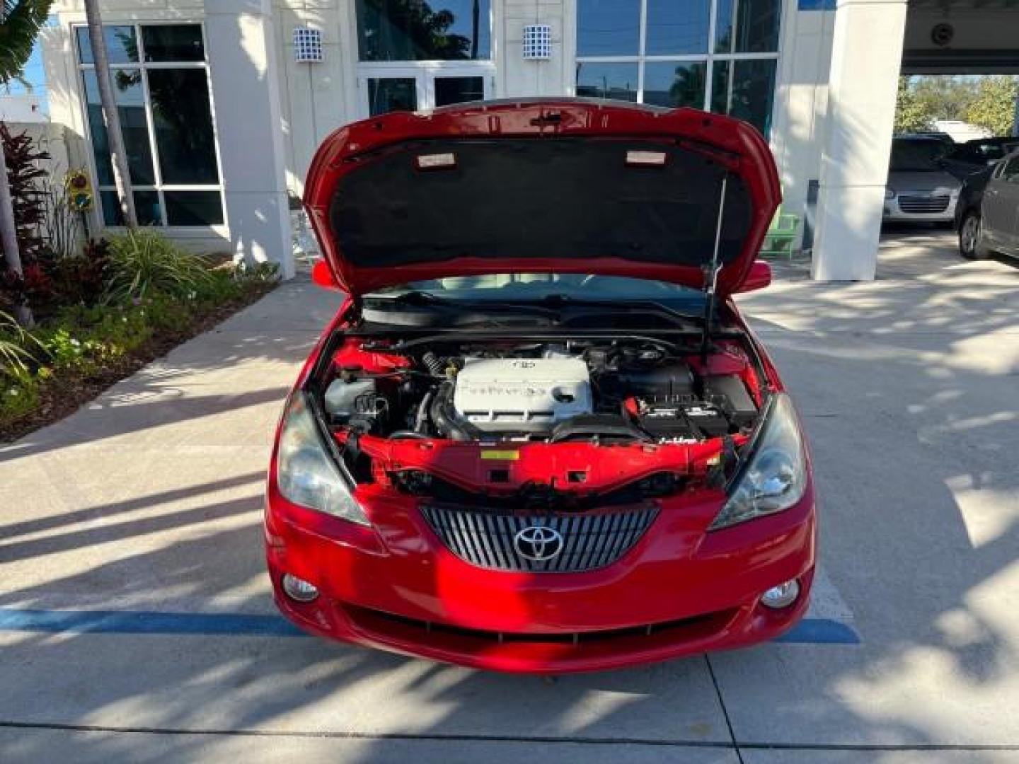 2005 Absolutely Red /Ivory Toyota Camry Solara SLE LOW MILES 45,207 (4T1FA38P45U) with an 3.3L DOHC SEFI VVT-i 24-Valve V6 Engine engine, Automatic transmission, located at 4701 North Dixie Hwy, Pompano Beach, FL, 33064, (954) 422-2889, 26.240938, -80.123474 - OUR WEBPAGE FLORIDACARS1.COM HAS OVER 100 PHOTOS AND FREE CARFAX LINK 2005 TOYOTA CAMRY SOLARA SE V6 ROAD READY 3.3L V6 VIN: 4T1FA38P45U047960 NO ACCIDENTS 29 MPG CONVERTIBLE NO RECALLS 3.3L V6 F DOHC 24V BACK UP CAMERA FLORIDA OWNER GASOLINE NAVIGATION LOW MILES 45,207 FRONT WHEEL DRIVE POWER LEATH - Photo#54