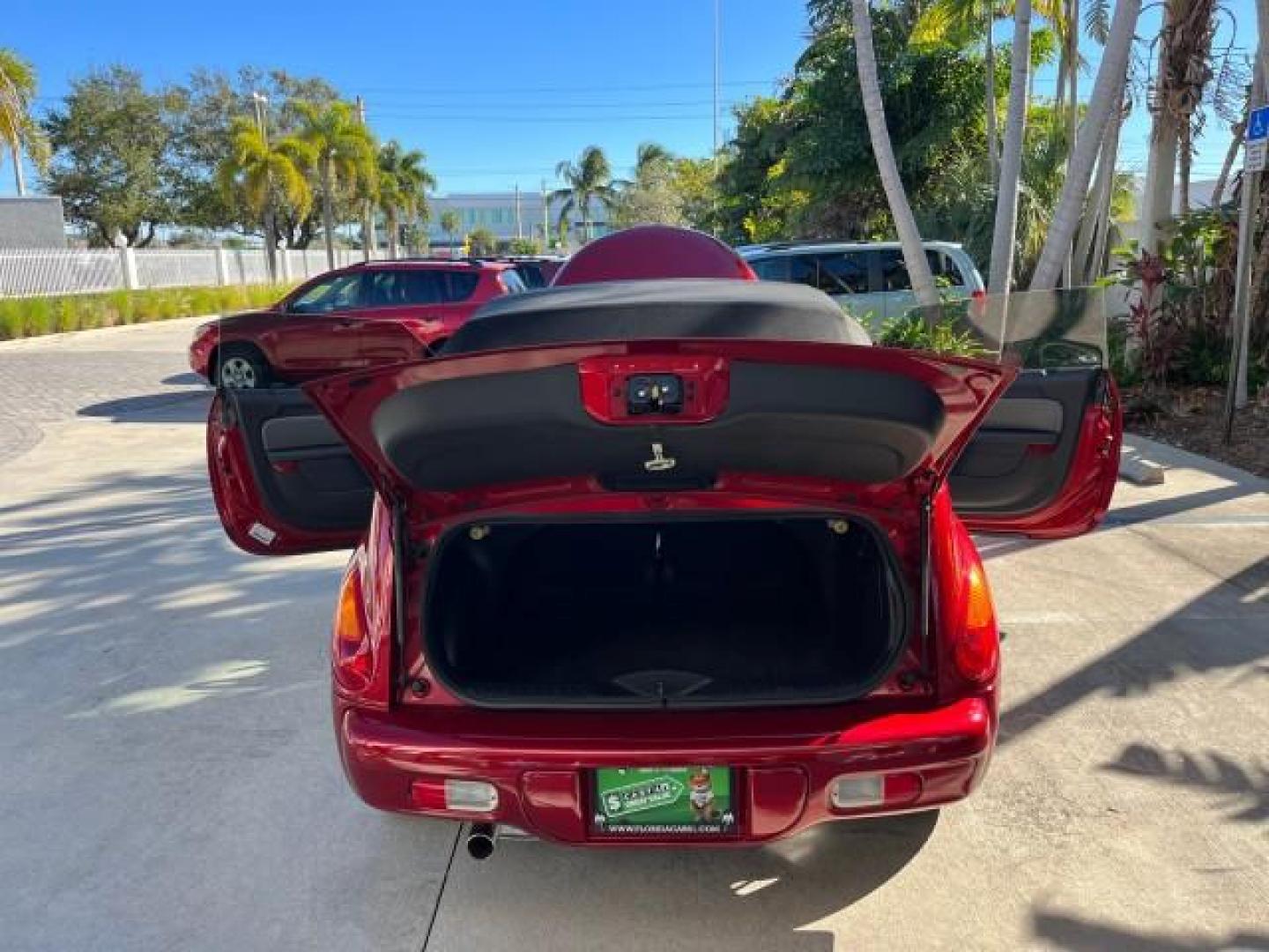 2005 Inferno Red Crystal Pearl /Dark Slate Gray Chrysler PT Cruiser GT LOW MILES 59,572 (3C3AY75S35T) with an 2.4L DOHC 16-Valve HO Turbo I4 Engine engine, Automatic transmission, located at 4701 North Dixie Hwy, Pompano Beach, FL, 33064, (954) 422-2889, 26.240938, -80.123474 - OUR WEBPAGE FLORIDACARS1.COM HAS OVER 100 PHOTOS AND FREE CARFAX LINK 2005 CHRYSLER PT CRUISER GT ROAD READY 2.4L I4 GT VIN: 3C3AY75S35T265610 LOW MILES 59,572 CONVERTIBLE NO ACCIDENTS NO RECALLS 2.4L I4 F DOHC 16V FLORIDA OWNER 27 MPG GASOLINE POWER LEATHER SEATS FRONT WHEEL DRIVE TURBO POWER CONVE - Photo#15