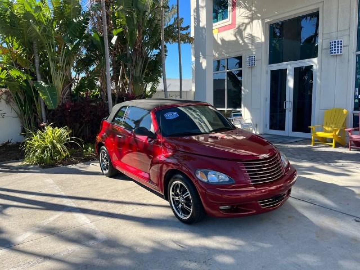 2005 Inferno Red Crystal Pearl /Dark Slate Gray Chrysler PT Cruiser GT LOW MILES 59,572 (3C3AY75S35T) with an 2.4L DOHC 16-Valve HO Turbo I4 Engine engine, Automatic transmission, located at 4701 North Dixie Hwy, Pompano Beach, FL, 33064, (954) 422-2889, 26.240938, -80.123474 - OUR WEBPAGE FLORIDACARS1.COM HAS OVER 100 PHOTOS AND FREE CARFAX LINK 2005 CHRYSLER PT CRUISER GT ROAD READY 2.4L I4 GT VIN: 3C3AY75S35T265610 LOW MILES 59,572 CONVERTIBLE NO ACCIDENTS NO RECALLS 2.4L I4 F DOHC 16V FLORIDA OWNER 27 MPG GASOLINE POWER LEATHER SEATS FRONT WHEEL DRIVE TURBO POWER CONVE - Photo#1