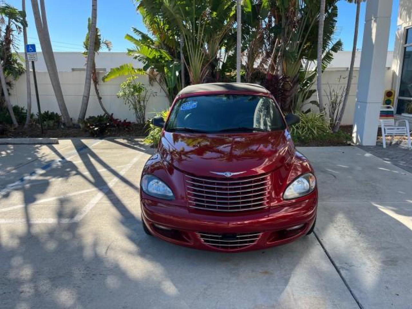 2005 Inferno Red Crystal Pearl /Dark Slate Gray Chrysler PT Cruiser GT LOW MILES 59,572 (3C3AY75S35T) with an 2.4L DOHC 16-Valve HO Turbo I4 Engine engine, Automatic transmission, located at 4701 North Dixie Hwy, Pompano Beach, FL, 33064, (954) 422-2889, 26.240938, -80.123474 - OUR WEBPAGE FLORIDACARS1.COM HAS OVER 100 PHOTOS AND FREE CARFAX LINK 2005 CHRYSLER PT CRUISER GT ROAD READY 2.4L I4 GT VIN: 3C3AY75S35T265610 LOW MILES 59,572 CONVERTIBLE NO ACCIDENTS NO RECALLS 2.4L I4 F DOHC 16V FLORIDA OWNER 27 MPG GASOLINE POWER LEATHER SEATS FRONT WHEEL DRIVE TURBO POWER CONVE - Photo#2