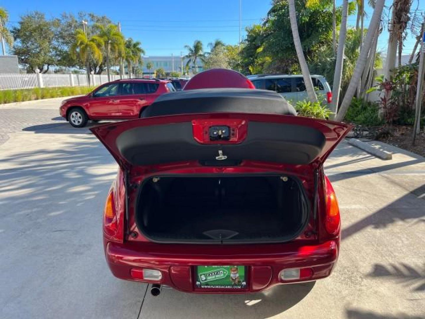 2005 Inferno Red Crystal Pearl /Dark Slate Gray Chrysler PT Cruiser GT LOW MILES 59,572 (3C3AY75S35T) with an 2.4L DOHC 16-Valve HO Turbo I4 Engine engine, Automatic transmission, located at 4701 North Dixie Hwy, Pompano Beach, FL, 33064, (954) 422-2889, 26.240938, -80.123474 - OUR WEBPAGE FLORIDACARS1.COM HAS OVER 100 PHOTOS AND FREE CARFAX LINK 2005 CHRYSLER PT CRUISER GT ROAD READY 2.4L I4 GT VIN: 3C3AY75S35T265610 LOW MILES 59,572 CONVERTIBLE NO ACCIDENTS NO RECALLS 2.4L I4 F DOHC 16V FLORIDA OWNER 27 MPG GASOLINE POWER LEATHER SEATS FRONT WHEEL DRIVE TURBO POWER CONVE - Photo#56