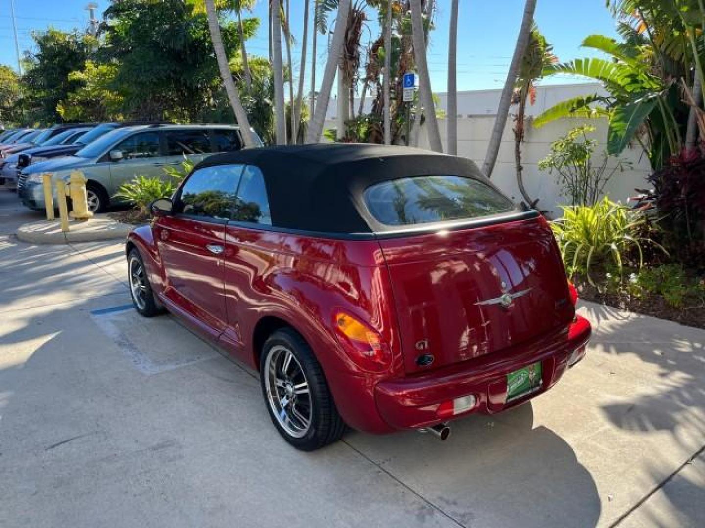 2005 Inferno Red Crystal Pearl /Dark Slate Gray Chrysler PT Cruiser GT LOW MILES 59,572 (3C3AY75S35T) with an 2.4L DOHC 16-Valve HO Turbo I4 Engine engine, Automatic transmission, located at 4701 North Dixie Hwy, Pompano Beach, FL, 33064, (954) 422-2889, 26.240938, -80.123474 - OUR WEBPAGE FLORIDACARS1.COM HAS OVER 100 PHOTOS AND FREE CARFAX LINK 2005 CHRYSLER PT CRUISER GT ROAD READY 2.4L I4 GT VIN: 3C3AY75S35T265610 LOW MILES 59,572 CONVERTIBLE NO ACCIDENTS NO RECALLS 2.4L I4 F DOHC 16V FLORIDA OWNER 27 MPG GASOLINE POWER LEATHER SEATS FRONT WHEEL DRIVE TURBO POWER CONVE - Photo#5