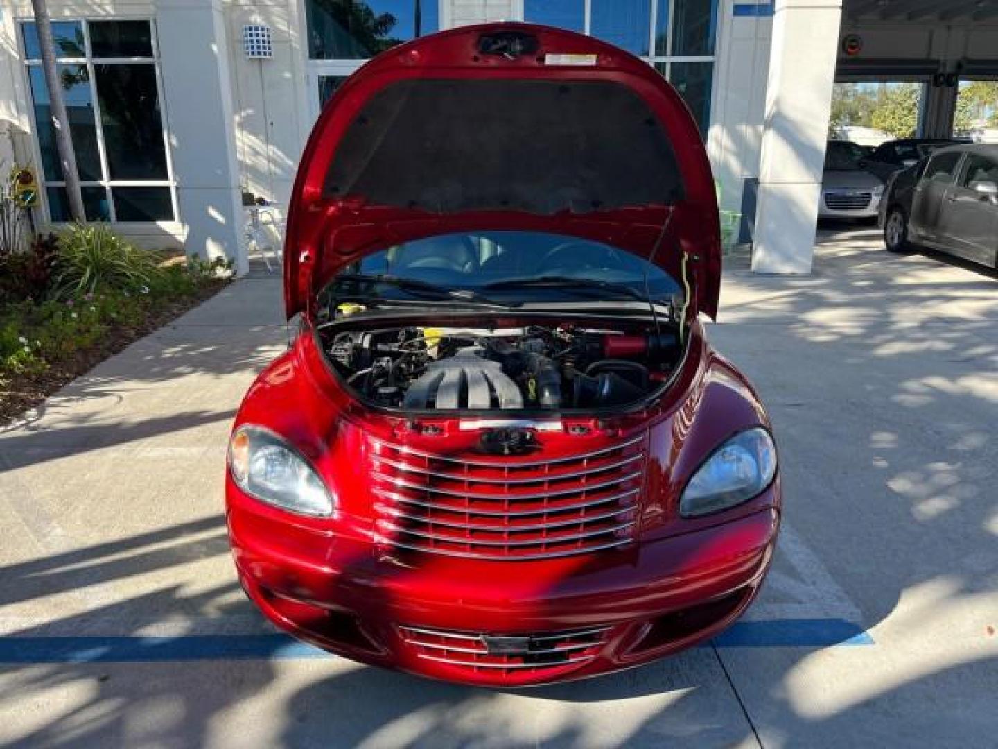 2005 Inferno Red Crystal Pearl /Dark Slate Gray Chrysler PT Cruiser GT LOW MILES 59,572 (3C3AY75S35T) with an 2.4L DOHC 16-Valve HO Turbo I4 Engine engine, Automatic transmission, located at 4701 North Dixie Hwy, Pompano Beach, FL, 33064, (954) 422-2889, 26.240938, -80.123474 - OUR WEBPAGE FLORIDACARS1.COM HAS OVER 100 PHOTOS AND FREE CARFAX LINK 2005 CHRYSLER PT CRUISER GT ROAD READY 2.4L I4 GT VIN: 3C3AY75S35T265610 LOW MILES 59,572 CONVERTIBLE NO ACCIDENTS NO RECALLS 2.4L I4 F DOHC 16V FLORIDA OWNER 27 MPG GASOLINE POWER LEATHER SEATS FRONT WHEEL DRIVE TURBO POWER CONVE - Photo#62