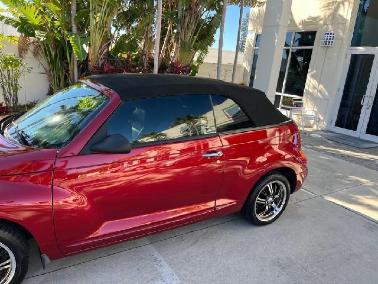 2005 Inferno Red Crystal Pearl /Dark Slate Gray Chrysler PT Cruiser GT LOW MILES 59,572 (3C3AY75S35T) with an 2.4L DOHC 16-Valve HO Turbo I4 Engine engine, Automatic transmission, located at 4701 North Dixie Hwy, Pompano Beach, FL, 33064, (954) 422-2889, 26.240938, -80.123474 - OUR WEBPAGE FLORIDACARS1.COM HAS OVER 100 PHOTOS AND FREE CARFAX LINK 2005 CHRYSLER PT CRUISER GT ROAD READY 2.4L I4 GT VIN: 3C3AY75S35T265610 LOW MILES 59,572 CONVERTIBLE NO ACCIDENTS NO RECALLS 2.4L I4 F DOHC 16V FLORIDA OWNER 27 MPG GASOLINE POWER LEATHER SEATS FRONT WHEEL DRIVE TURBO POWER CONVE - Photo#78