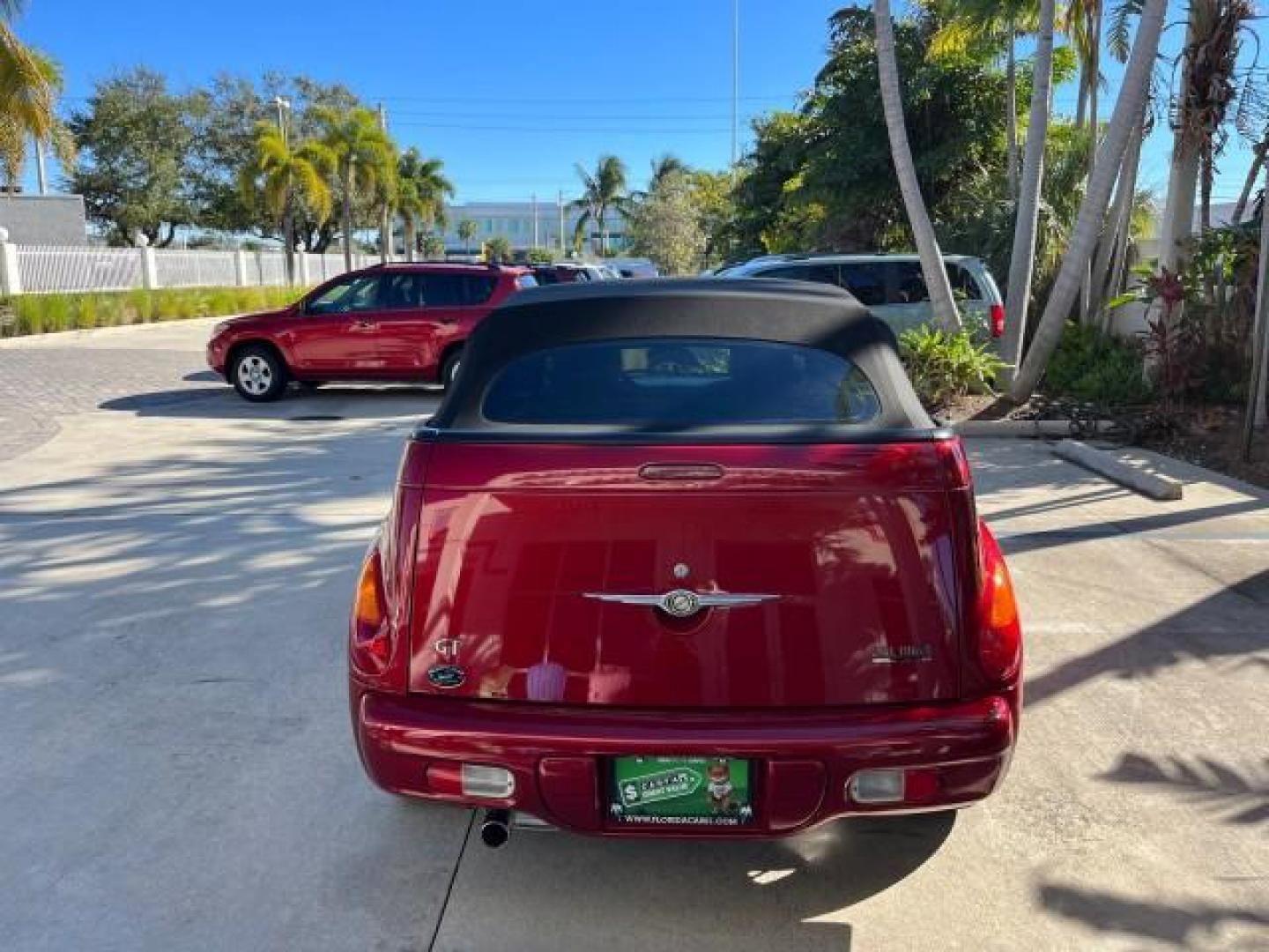 2005 Inferno Red Crystal Pearl /Dark Slate Gray Chrysler PT Cruiser GT LOW MILES 59,572 (3C3AY75S35T) with an 2.4L DOHC 16-Valve HO Turbo I4 Engine engine, Automatic transmission, located at 4701 North Dixie Hwy, Pompano Beach, FL, 33064, (954) 422-2889, 26.240938, -80.123474 - OUR WEBPAGE FLORIDACARS1.COM HAS OVER 100 PHOTOS AND FREE CARFAX LINK 2005 CHRYSLER PT CRUISER GT ROAD READY 2.4L I4 GT VIN: 3C3AY75S35T265610 LOW MILES 59,572 CONVERTIBLE NO ACCIDENTS NO RECALLS 2.4L I4 F DOHC 16V FLORIDA OWNER 27 MPG GASOLINE POWER LEATHER SEATS FRONT WHEEL DRIVE TURBO POWER CONVE - Photo#86