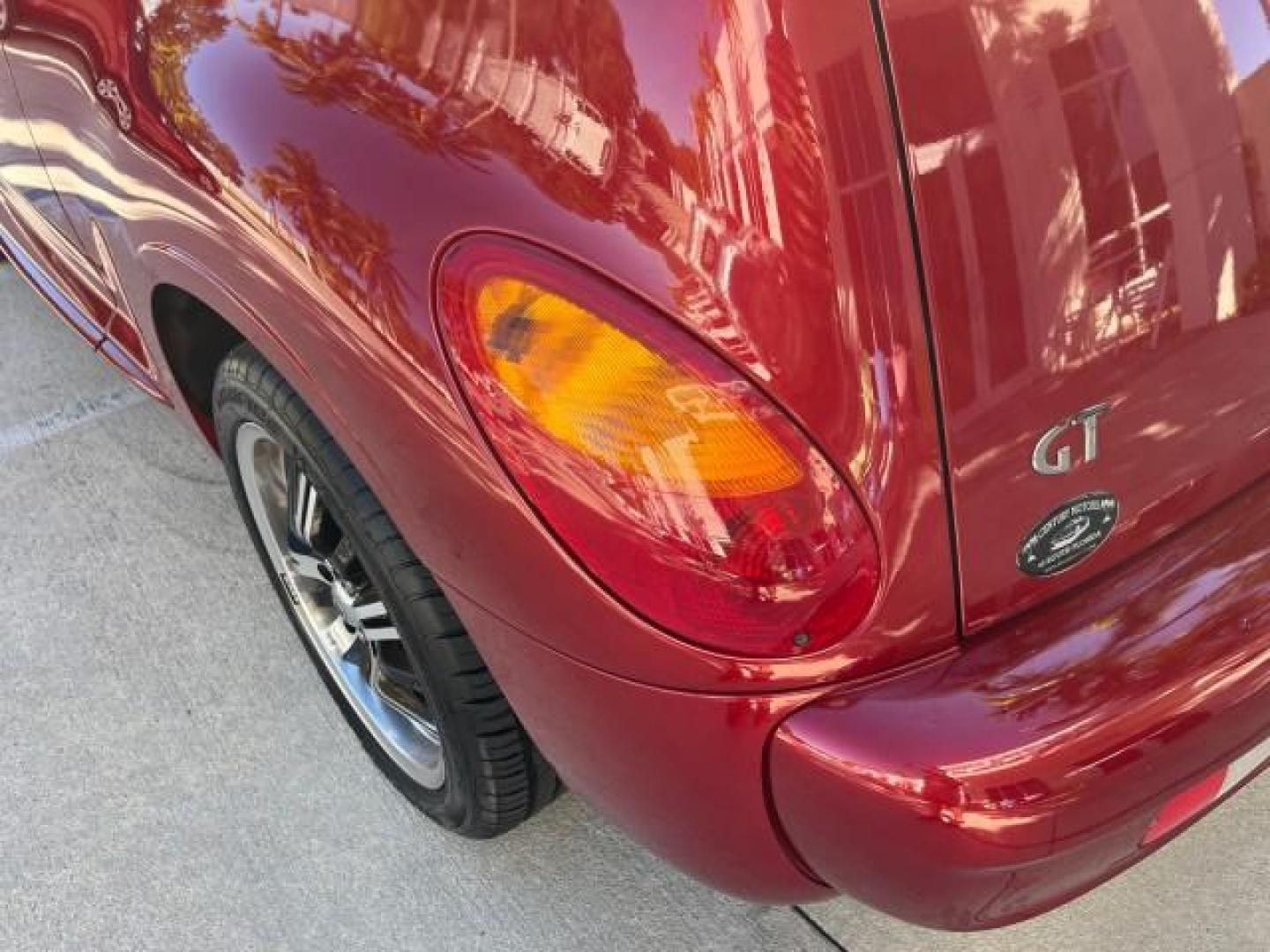 2005 Inferno Red Crystal Pearl /Dark Slate Gray Chrysler PT Cruiser GT LOW MILES 59,572 (3C3AY75S35T) with an 2.4L DOHC 16-Valve HO Turbo I4 Engine engine, Automatic transmission, located at 4701 North Dixie Hwy, Pompano Beach, FL, 33064, (954) 422-2889, 26.240938, -80.123474 - OUR WEBPAGE FLORIDACARS1.COM HAS OVER 100 PHOTOS AND FREE CARFAX LINK 2005 CHRYSLER PT CRUISER GT ROAD READY 2.4L I4 GT VIN: 3C3AY75S35T265610 LOW MILES 59,572 CONVERTIBLE NO ACCIDENTS NO RECALLS 2.4L I4 F DOHC 16V FLORIDA OWNER 27 MPG GASOLINE POWER LEATHER SEATS FRONT WHEEL DRIVE TURBO POWER CONVE - Photo#94