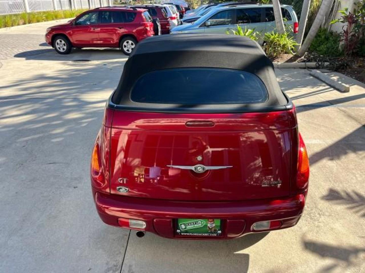 2005 Inferno Red Crystal Pearl /Dark Slate Gray Chrysler PT Cruiser GT LOW MILES 59,572 (3C3AY75S35T) with an 2.4L DOHC 16-Valve HO Turbo I4 Engine engine, Automatic transmission, located at 4701 North Dixie Hwy, Pompano Beach, FL, 33064, (954) 422-2889, 26.240938, -80.123474 - OUR WEBPAGE FLORIDACARS1.COM HAS OVER 100 PHOTOS AND FREE CARFAX LINK 2005 CHRYSLER PT CRUISER GT ROAD READY 2.4L I4 GT VIN: 3C3AY75S35T265610 LOW MILES 59,572 CONVERTIBLE NO ACCIDENTS NO RECALLS 2.4L I4 F DOHC 16V FLORIDA OWNER 27 MPG GASOLINE POWER LEATHER SEATS FRONT WHEEL DRIVE TURBO POWER CONVE - Photo#97