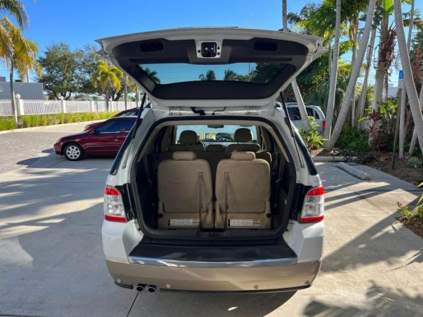 2008 Oxford White /Camel Ford Taurus X Eddie Bauer LOW MILES 39,063 (1FMDK07W18G) with an 3.5L SMPI 24-Valve V6 Duratec Engine engine, Automatic transmission, located at 4701 North Dixie Hwy, Pompano Beach, FL, 33064, (954) 422-2889, 26.240938, -80.123474 - OUR WEBPAGE FLORIDACARS1.COM HAS OVER 100 PHOTOS AND FREE CARFAX LINK 2008 FORD TAURUS X EDDIE BAUER ROAD READY 3.5L V6 VIN: 1FMDK07W18GA43864 FLORIDA OWNER 4 DOOR WAGON/SPORT UTILITY LOW MILES 39,063 3.5L V6 F 3 ROW LEATHER SEATS GASOLINE PARK SENSORS POWER SEATS/MIRRORS FRONT WHEEL DRIVE POWER SUN - Photo#69