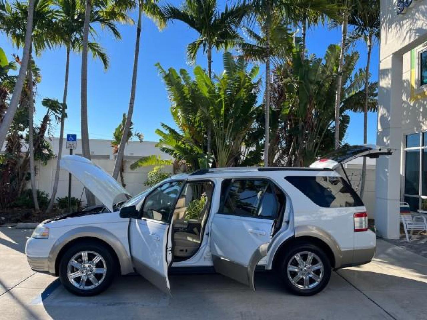 2008 Oxford White /Camel Ford Taurus X Eddie Bauer LOW MILES 39,063 (1FMDK07W18G) with an 3.5L SMPI 24-Valve V6 Duratec Engine engine, Automatic transmission, located at 4701 North Dixie Hwy, Pompano Beach, FL, 33064, (954) 422-2889, 26.240938, -80.123474 - OUR WEBPAGE FLORIDACARS1.COM HAS OVER 100 PHOTOS AND FREE CARFAX LINK 2008 FORD TAURUS X EDDIE BAUER ROAD READY 3.5L V6 VIN: 1FMDK07W18GA43864 FLORIDA OWNER 4 DOOR WAGON/SPORT UTILITY LOW MILES 39,063 3.5L V6 F 3 ROW LEATHER SEATS GASOLINE PARK SENSORS POWER SEATS/MIRRORS FRONT WHEEL DRIVE POWER SUN - Photo#8