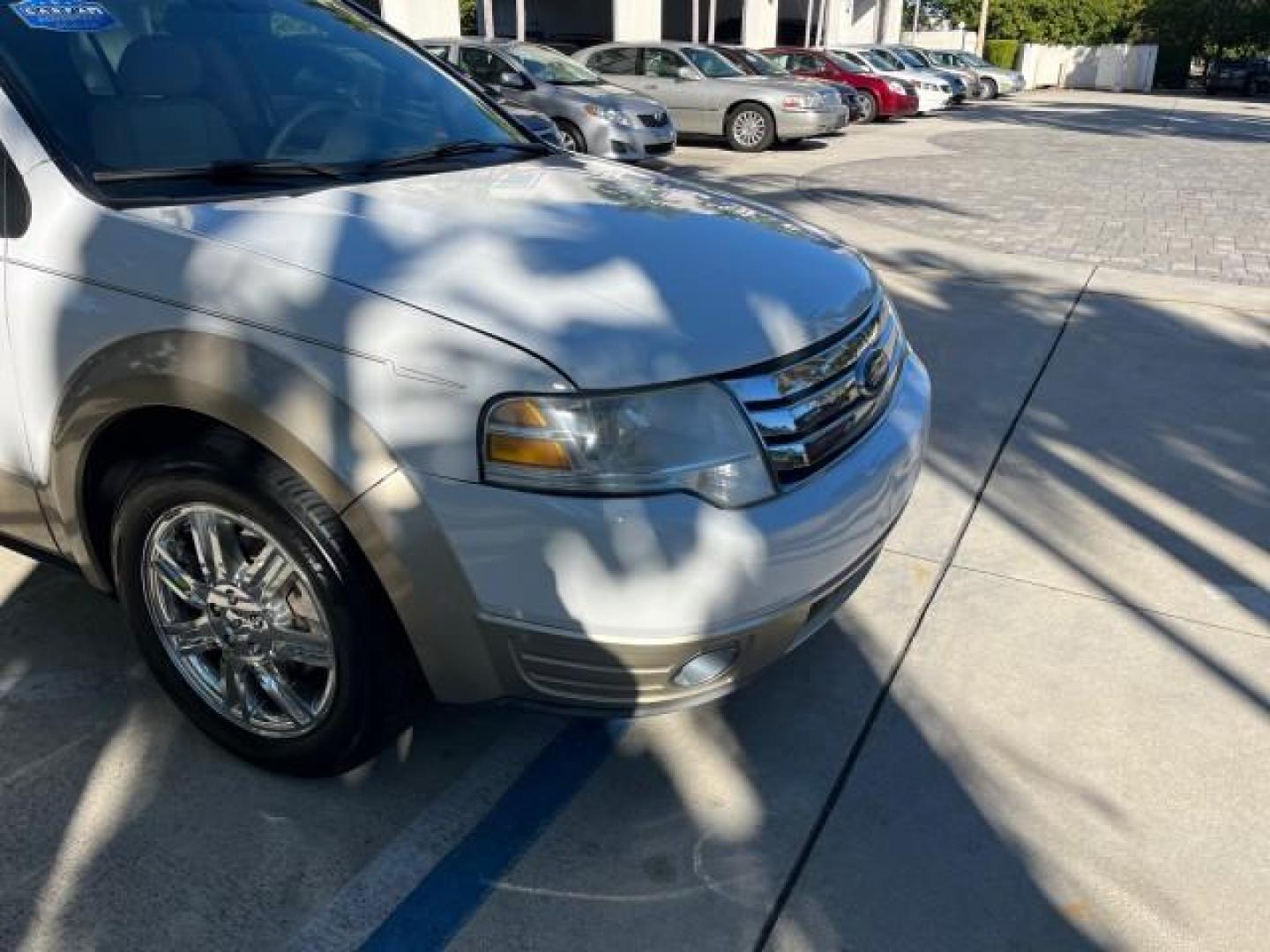 2008 Oxford White /Camel Ford Taurus X Eddie Bauer LOW MILES 39,063 (1FMDK07W18G) with an 3.5L SMPI 24-Valve V6 Duratec Engine engine, Automatic transmission, located at 4701 North Dixie Hwy, Pompano Beach, FL, 33064, (954) 422-2889, 26.240938, -80.123474 - OUR WEBPAGE FLORIDACARS1.COM HAS OVER 100 PHOTOS AND FREE CARFAX LINK 2008 FORD TAURUS X EDDIE BAUER ROAD READY 3.5L V6 VIN: 1FMDK07W18GA43864 FLORIDA OWNER 4 DOOR WAGON/SPORT UTILITY LOW MILES 39,063 3.5L V6 F 3 ROW LEATHER SEATS GASOLINE PARK SENSORS POWER SEATS/MIRRORS FRONT WHEEL DRIVE POWER SUN - Photo#95