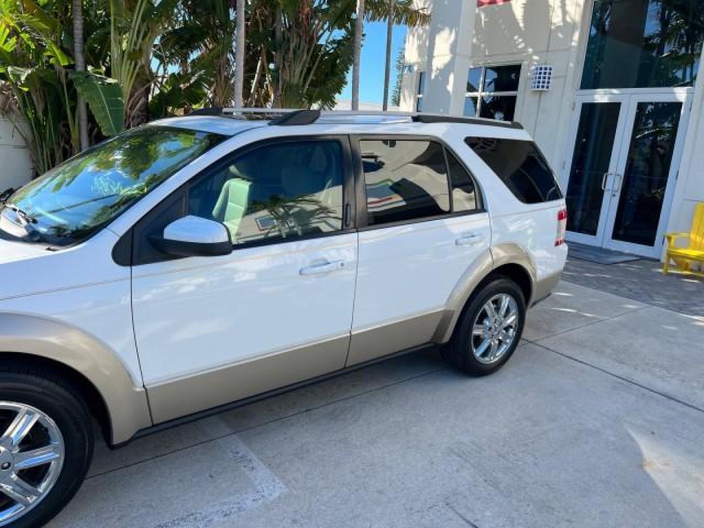 2008 Oxford White /Camel Ford Taurus X Eddie Bauer LOW MILES 39,063 (1FMDK07W18G) with an 3.5L SMPI 24-Valve V6 Duratec Engine engine, Automatic transmission, located at 4701 North Dixie Hwy, Pompano Beach, FL, 33064, (954) 422-2889, 26.240938, -80.123474 - OUR WEBPAGE FLORIDACARS1.COM HAS OVER 100 PHOTOS AND FREE CARFAX LINK 2008 FORD TAURUS X EDDIE BAUER ROAD READY 3.5L V6 VIN: 1FMDK07W18GA43864 FLORIDA OWNER 4 DOOR WAGON/SPORT UTILITY LOW MILES 39,063 3.5L V6 F 3 ROW LEATHER SEATS GASOLINE PARK SENSORS POWER SEATS/MIRRORS FRONT WHEEL DRIVE POWER SUN - Photo#96