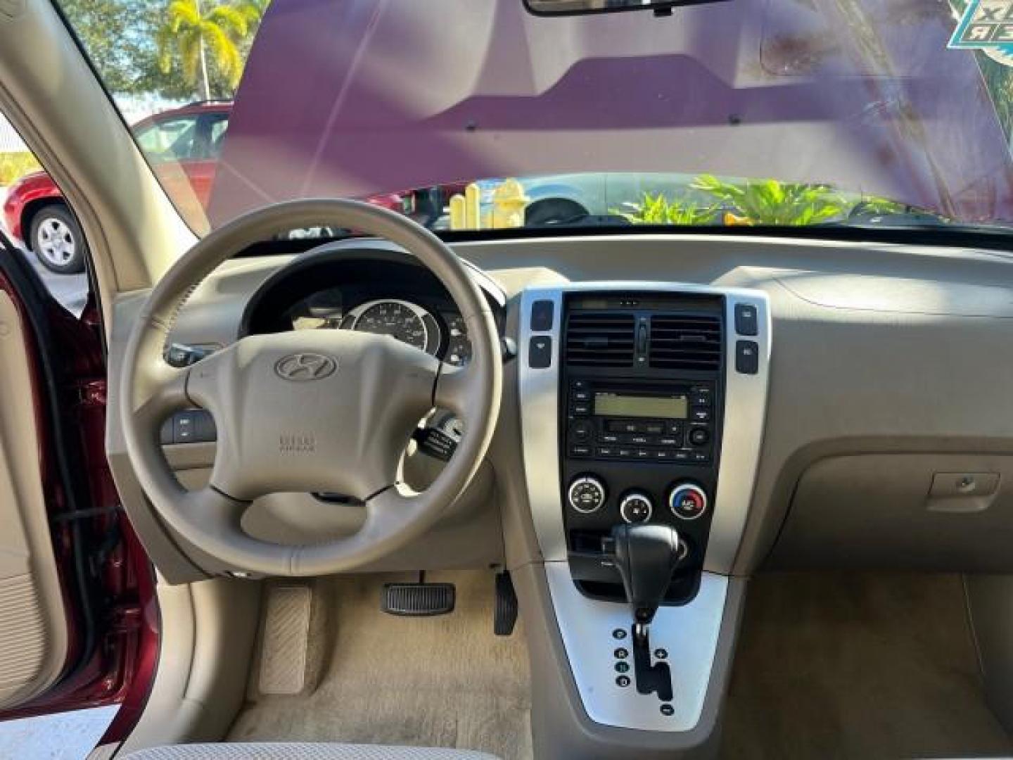 2006 Mesa Red /Beige Hyundai Tucson 1 FL GLS LOW MILES 47,967 (KM8JN12D96U) with an 2.7L DOHC MPI 24-Valve V6 Engine engine, Automatic transmission, located at 4701 North Dixie Hwy, Pompano Beach, FL, 33064, (954) 422-2889, 26.240938, -80.123474 - OUR WEBPAGE FLORIDACARS1.COM HAS OVER 100 PHOTOS AND FREE CARFAX LINK 2006 HYUNDAI TUCSON GLS ROAD READY 2.7L V6 VIN: KM8JN12D96U359484 NO ACCIDENTS 4 DOOR WAGON/SPORT UTILITY NO RECALLS 26 MPG 2.7L V6 F DOHC 24V 1 OWNER FLORIDA GASOLINE POWER SUNROOF FRONT WHEEL DRIVE LOW MILES 47,967 Anti-Theft Sy - Photo#34