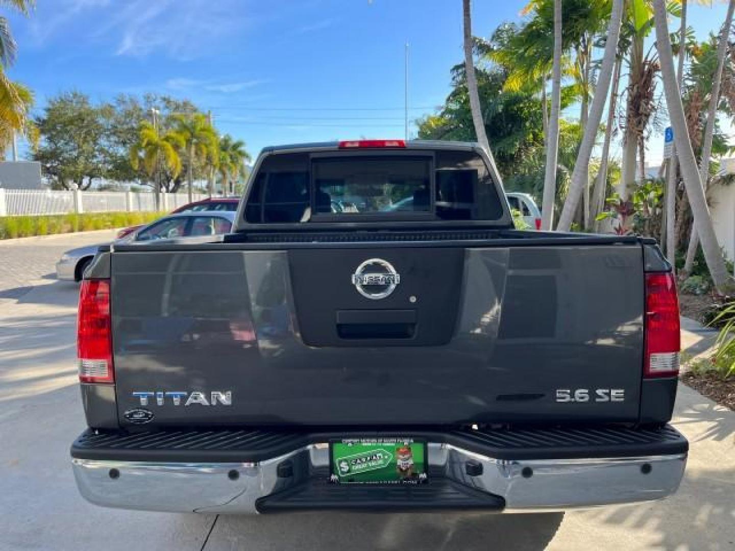 2009 Smoke Gray /Almond Nissan Titan CREW CAB LE LOW MILES 125,781 (1N6BA07D29N) with an 5.6L DOHC 32-Valve V8 FFV Engine engine, Automatic transmission, located at 4701 North Dixie Hwy, Pompano Beach, FL, 33064, (954) 422-2889, 26.240938, -80.123474 - OUR WEBPAGE FLORIDACARS1.COM HAS OVER 100 PHOTOS AND FREE CARFAX LINK 2009 NISSAN TITAN SE FFV ROAD READY WORK READY VIN: 1N6BA07D29N304796 FLORIDA OWNER 5.6L V8 CREW PICKUP LOW MILES 125,781 5.6L V8 F DOHC 32V BACK UP SENSORS FLEX FUEL 15 SERVICE RECORDS REAR WHEEL DRIVE POWER SEATS 5,6FT BED LENGH - Photo#99