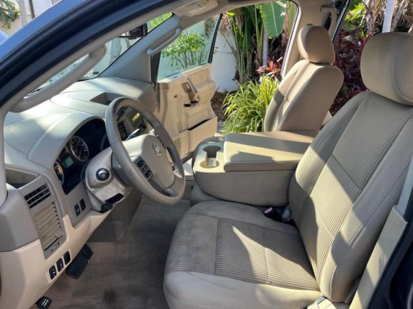 2009 Smoke Gray /Almond Nissan Titan CREW CAB LE LOW MILES 125,781 (1N6BA07D29N) with an 5.6L DOHC 32-Valve V8 FFV Engine engine, Automatic transmission, located at 4701 North Dixie Hwy, Pompano Beach, FL, 33064, (954) 422-2889, 26.240938, -80.123474 - OUR WEBPAGE FLORIDACARS1.COM HAS OVER 100 PHOTOS AND FREE CARFAX LINK 2009 NISSAN TITAN SE FFV ROAD READY WORK READY VIN: 1N6BA07D29N304796 FLORIDA OWNER 5.6L V8 CREW PICKUP LOW MILES 125,781 5.6L V8 F DOHC 32V BACK UP SENSORS FLEX FUEL 15 SERVICE RECORDS REAR WHEEL DRIVE POWER SEATS 5,6FT BED LENGH - Photo#10