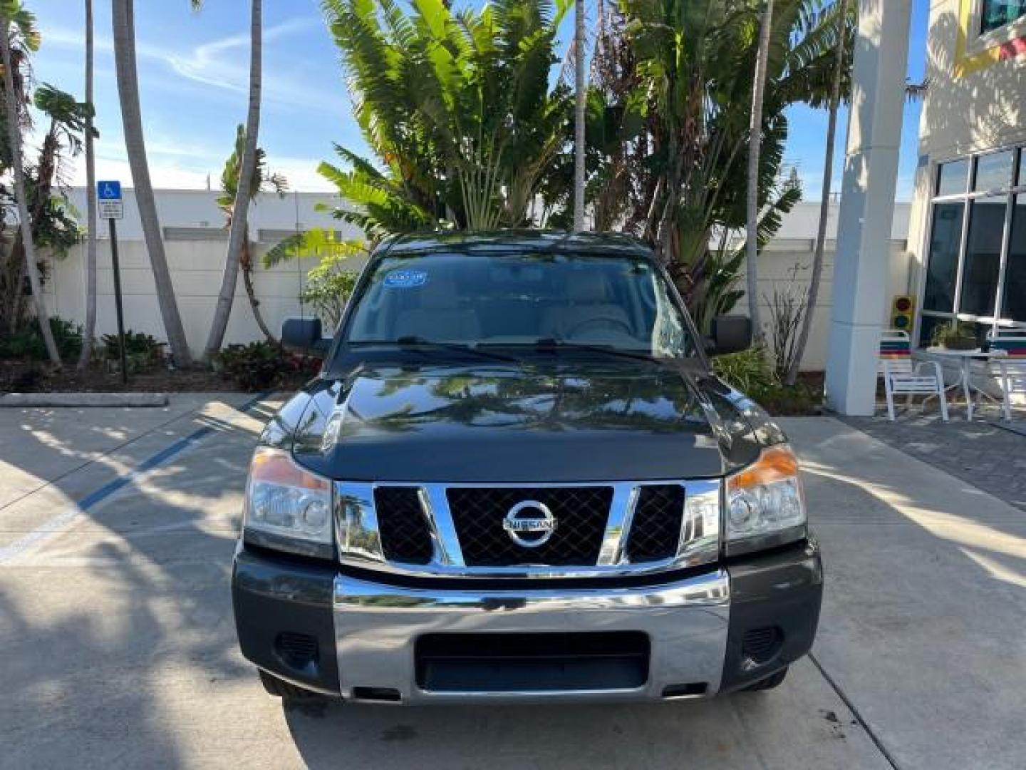 2009 Smoke Gray /Almond Nissan Titan CREW CAB LE LOW MILES 125,781 (1N6BA07D29N) with an 5.6L DOHC 32-Valve V8 FFV Engine engine, Automatic transmission, located at 4701 North Dixie Hwy, Pompano Beach, FL, 33064, (954) 422-2889, 26.240938, -80.123474 - OUR WEBPAGE FLORIDACARS1.COM HAS OVER 100 PHOTOS AND FREE CARFAX LINK 2009 NISSAN TITAN SE FFV ROAD READY WORK READY VIN: 1N6BA07D29N304796 FLORIDA OWNER 5.6L V8 CREW PICKUP LOW MILES 125,781 5.6L V8 F DOHC 32V BACK UP SENSORS FLEX FUEL 15 SERVICE RECORDS REAR WHEEL DRIVE POWER SEATS 5,6FT BED LENGH - Photo#2