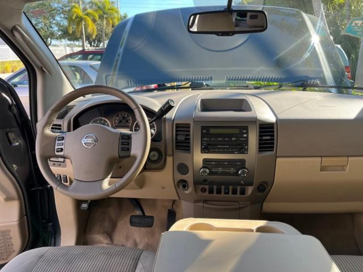 2009 Smoke Gray /Almond Nissan Titan CREW CAB LE LOW MILES 125,781 (1N6BA07D29N) with an 5.6L DOHC 32-Valve V8 FFV Engine engine, Automatic transmission, located at 4701 North Dixie Hwy, Pompano Beach, FL, 33064, (954) 422-2889, 26.240938, -80.123474 - OUR WEBPAGE FLORIDACARS1.COM HAS OVER 100 PHOTOS AND FREE CARFAX LINK 2009 NISSAN TITAN SE FFV ROAD READY WORK READY VIN: 1N6BA07D29N304796 FLORIDA OWNER 5.6L V8 CREW PICKUP LOW MILES 125,781 5.6L V8 F DOHC 32V BACK UP SENSORS FLEX FUEL 15 SERVICE RECORDS REAR WHEEL DRIVE POWER SEATS 5,6FT BED LENGH - Photo#37