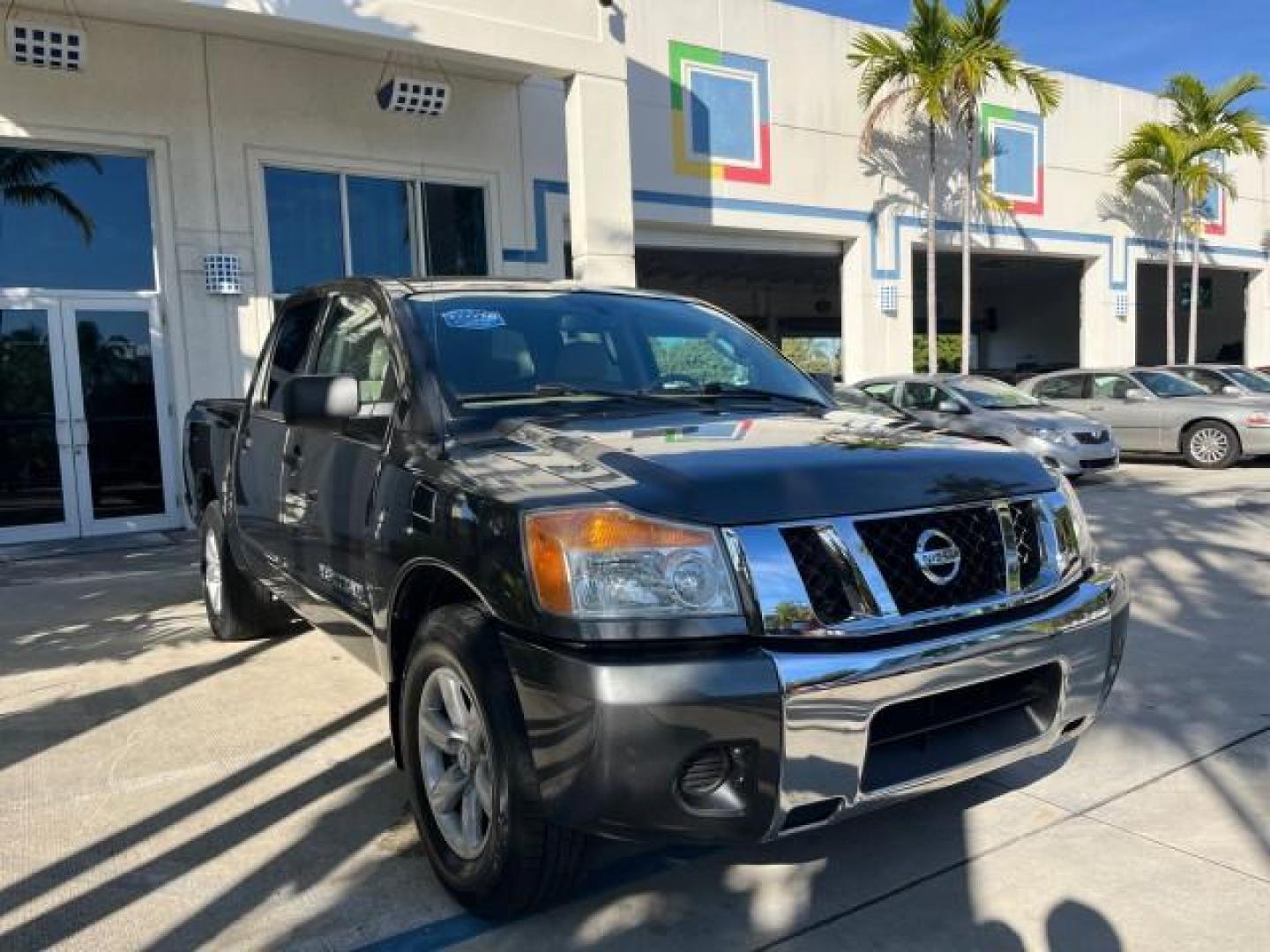 2009 Smoke Gray /Almond Nissan Titan CREW CAB LE LOW MILES 125,781 (1N6BA07D29N) with an 5.6L DOHC 32-Valve V8 FFV Engine engine, Automatic transmission, located at 4701 North Dixie Hwy, Pompano Beach, FL, 33064, (954) 422-2889, 26.240938, -80.123474 - OUR WEBPAGE FLORIDACARS1.COM HAS OVER 100 PHOTOS AND FREE CARFAX LINK 2009 NISSAN TITAN SE FFV ROAD READY WORK READY VIN: 1N6BA07D29N304796 FLORIDA OWNER 5.6L V8 CREW PICKUP LOW MILES 125,781 5.6L V8 F DOHC 32V BACK UP SENSORS FLEX FUEL 15 SERVICE RECORDS REAR WHEEL DRIVE POWER SEATS 5,6FT BED LENGH - Photo#77