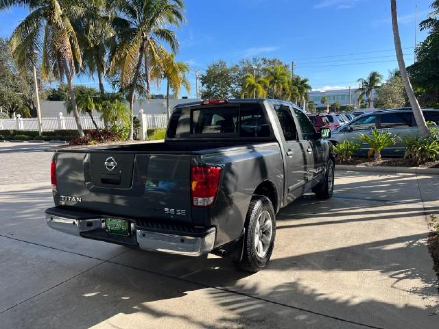 2009 Smoke Gray /Almond Nissan Titan CREW CAB LE LOW MILES 125,781 (1N6BA07D29N) with an 5.6L DOHC 32-Valve V8 FFV Engine engine, Automatic transmission, located at 4701 North Dixie Hwy, Pompano Beach, FL, 33064, (954) 422-2889, 26.240938, -80.123474 - OUR WEBPAGE FLORIDACARS1.COM HAS OVER 100 PHOTOS AND FREE CARFAX LINK 2009 NISSAN TITAN SE FFV ROAD READY WORK READY VIN: 1N6BA07D29N304796 FLORIDA OWNER 5.6L V8 CREW PICKUP LOW MILES 125,781 5.6L V8 F DOHC 32V BACK UP SENSORS FLEX FUEL 15 SERVICE RECORDS REAR WHEEL DRIVE POWER SEATS 5,6FT BED LENGH - Photo#7