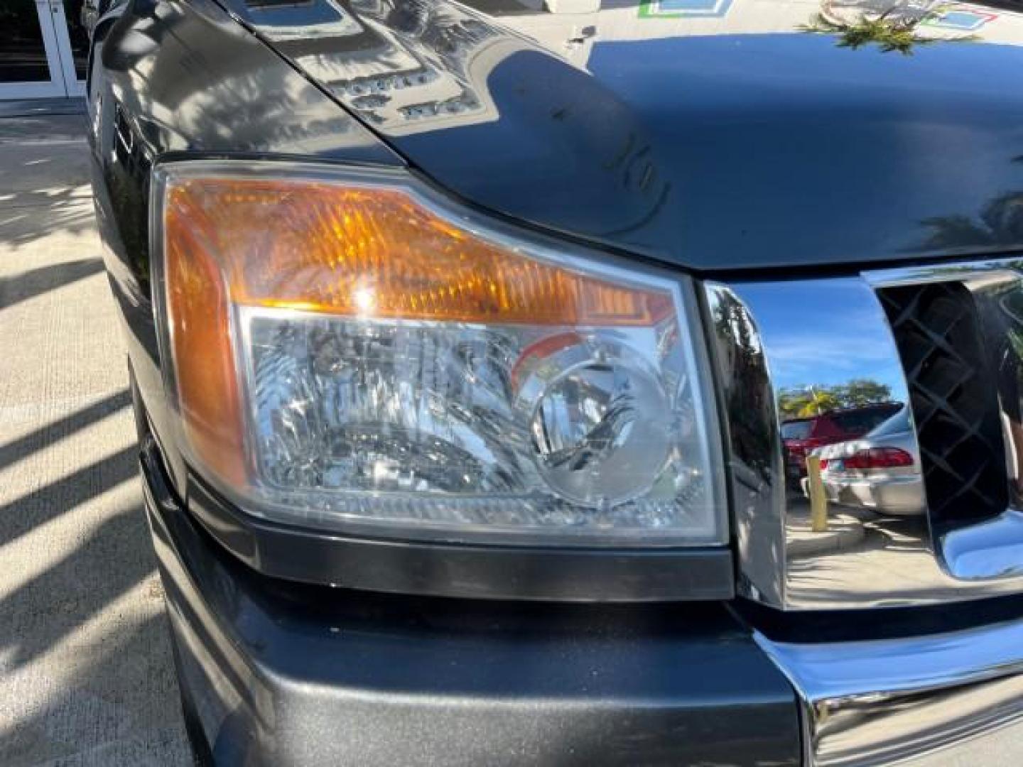 2009 Smoke Gray /Almond Nissan Titan CREW CAB LE LOW MILES 125,781 (1N6BA07D29N) with an 5.6L DOHC 32-Valve V8 FFV Engine engine, Automatic transmission, located at 4701 North Dixie Hwy, Pompano Beach, FL, 33064, (954) 422-2889, 26.240938, -80.123474 - OUR WEBPAGE FLORIDACARS1.COM HAS OVER 100 PHOTOS AND FREE CARFAX LINK 2009 NISSAN TITAN SE FFV ROAD READY WORK READY VIN: 1N6BA07D29N304796 FLORIDA OWNER 5.6L V8 CREW PICKUP LOW MILES 125,781 5.6L V8 F DOHC 32V BACK UP SENSORS FLEX FUEL 15 SERVICE RECORDS REAR WHEEL DRIVE POWER SEATS 5,6FT BED LENGH - Photo#80