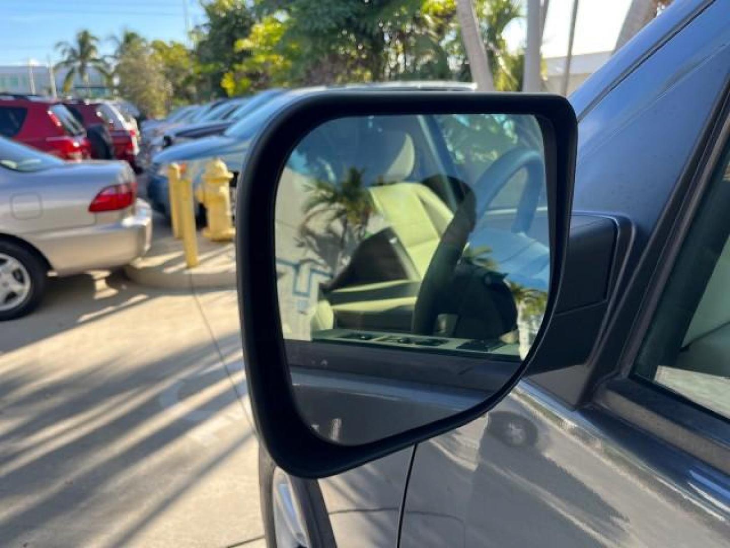 2009 Smoke Gray /Almond Nissan Titan CREW CAB LE LOW MILES 125,781 (1N6BA07D29N) with an 5.6L DOHC 32-Valve V8 FFV Engine engine, Automatic transmission, located at 4701 North Dixie Hwy, Pompano Beach, FL, 33064, (954) 422-2889, 26.240938, -80.123474 - OUR WEBPAGE FLORIDACARS1.COM HAS OVER 100 PHOTOS AND FREE CARFAX LINK 2009 NISSAN TITAN SE FFV ROAD READY WORK READY VIN: 1N6BA07D29N304796 FLORIDA OWNER 5.6L V8 CREW PICKUP LOW MILES 125,781 5.6L V8 F DOHC 32V BACK UP SENSORS FLEX FUEL 15 SERVICE RECORDS REAR WHEEL DRIVE POWER SEATS 5,6FT BED LENGH - Photo#89