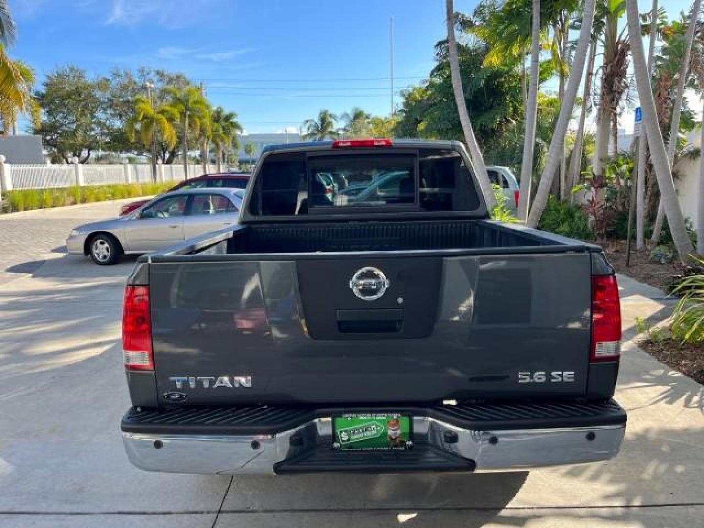 2009 Smoke Gray /Almond Nissan Titan CREW CAB LE LOW MILES 125,781 (1N6BA07D29N) with an 5.6L DOHC 32-Valve V8 FFV Engine engine, Automatic transmission, located at 4701 North Dixie Hwy, Pompano Beach, FL, 33064, (954) 422-2889, 26.240938, -80.123474 - OUR WEBPAGE FLORIDACARS1.COM HAS OVER 100 PHOTOS AND FREE CARFAX LINK 2009 NISSAN TITAN SE FFV ROAD READY WORK READY VIN: 1N6BA07D29N304796 FLORIDA OWNER 5.6L V8 CREW PICKUP LOW MILES 125,781 5.6L V8 F DOHC 32V BACK UP SENSORS FLEX FUEL 15 SERVICE RECORDS REAR WHEEL DRIVE POWER SEATS 5,6FT BED LENGH - Photo#96