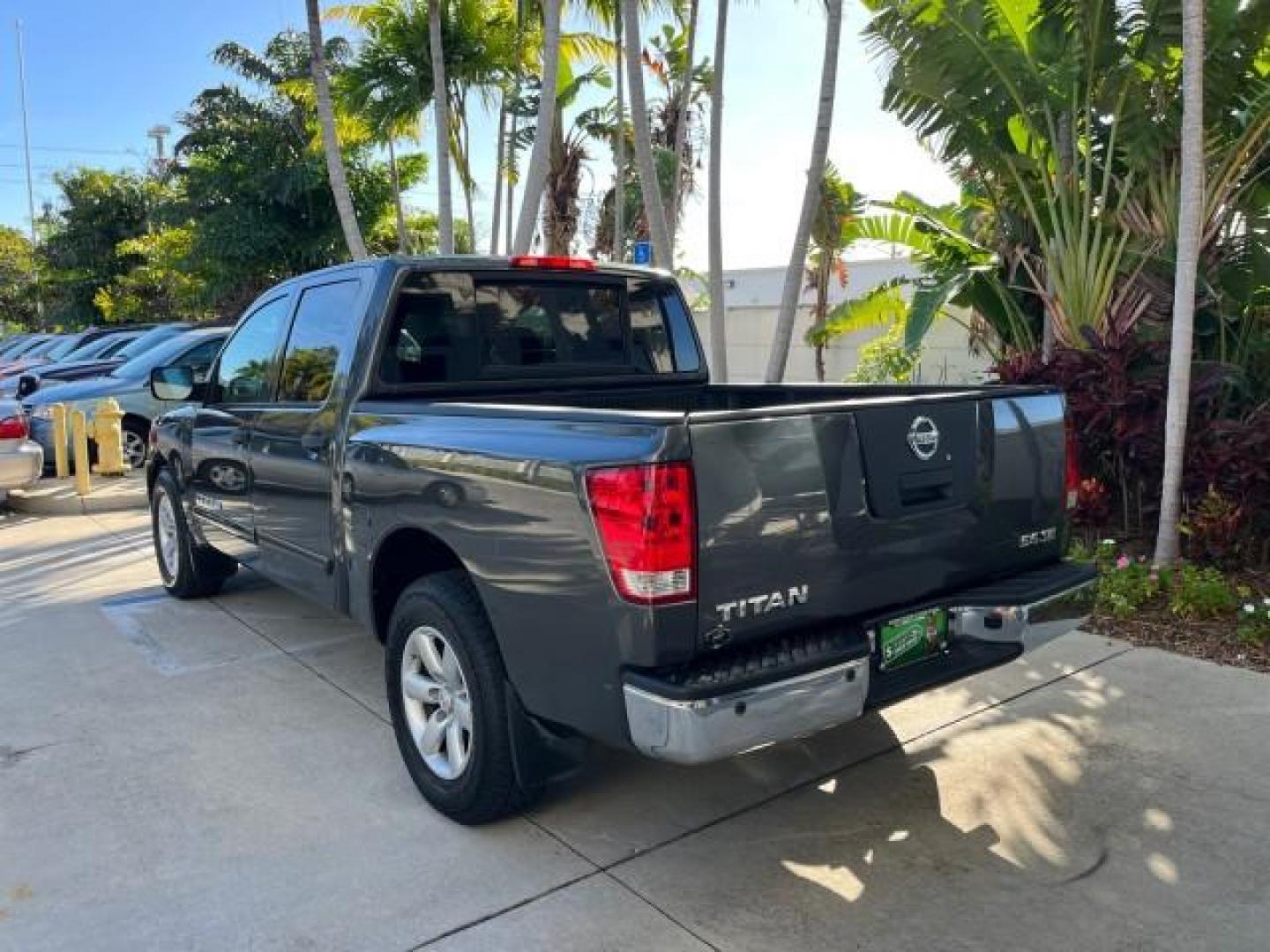 2009 Smoke Gray /Almond Nissan Titan CREW CAB LE LOW MILES 125,781 (1N6BA07D29N) with an 5.6L DOHC 32-Valve V8 FFV Engine engine, Automatic transmission, located at 4701 North Dixie Hwy, Pompano Beach, FL, 33064, (954) 422-2889, 26.240938, -80.123474 - OUR WEBPAGE FLORIDACARS1.COM HAS OVER 100 PHOTOS AND FREE CARFAX LINK 2009 NISSAN TITAN SE FFV ROAD READY WORK READY VIN: 1N6BA07D29N304796 FLORIDA OWNER 5.6L V8 CREW PICKUP LOW MILES 125,781 5.6L V8 F DOHC 32V BACK UP SENSORS FLEX FUEL 15 SERVICE RECORDS REAR WHEEL DRIVE POWER SEATS 5,6FT BED LENGH - Photo#97