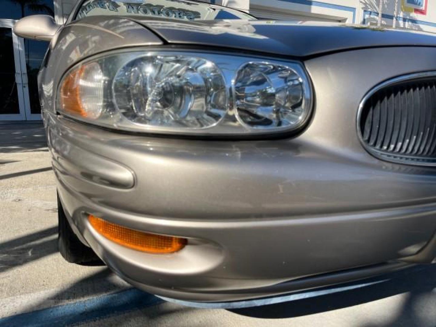 2004 Light Bronzemist Metallic /Medium Gray Buick LeSabre Limited LOW MILES 70,744 (1G4HR54K14U) with an 3.8L 3800 V6 SFI Engine engine, Automatic transmission, located at 4701 North Dixie Hwy, Pompano Beach, FL, 33064, (954) 422-2889, 26.240938, -80.123474 - OUR WEBPAGE FLORIDACARS1.COM HAS OVER 100 PHOTOS AND FREE CARFAX LINK 2004 BUICK LESABRE LIMITED ROAD READY 3.8L V6 VIN: 1G4HR54K14U145978 NO RECALLS 29 MPG SEDAN 4 DR POWER LEATHER SEATS 3.8L V6 F OHV FLORIDA OWNER GASOLINE LOW MILES 70,744 FRONT WHEEL DRIVE LIMITED POWER MIRRORS Air Suspension All - Photo#74