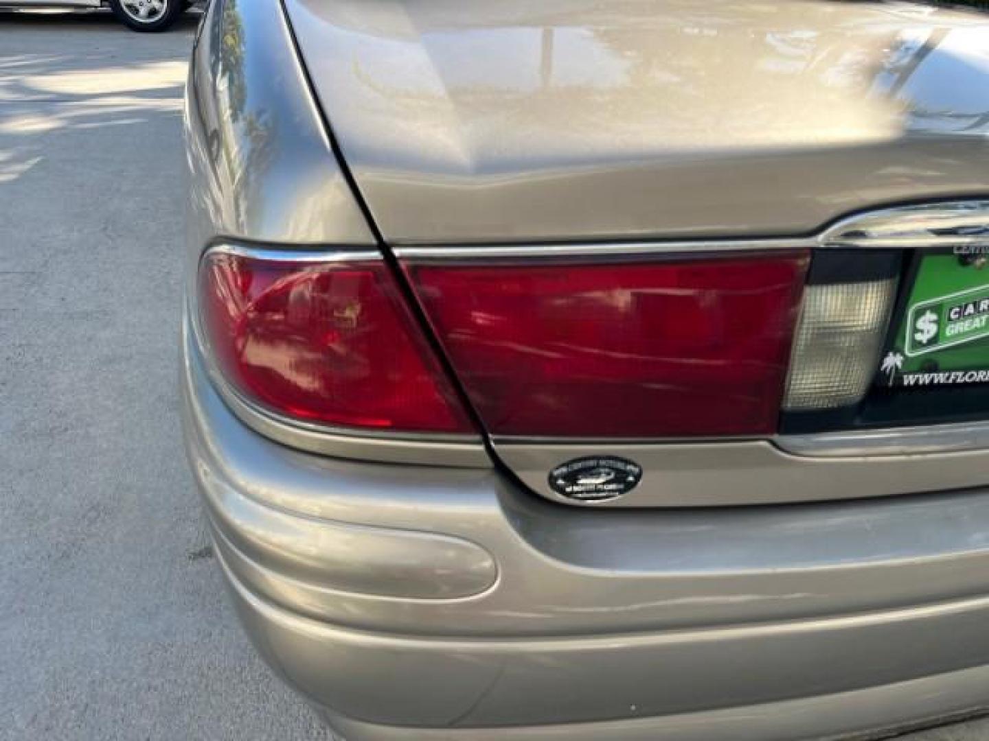 2004 Light Bronzemist Metallic /Medium Gray Buick LeSabre Limited LOW MILES 70,744 (1G4HR54K14U) with an 3.8L 3800 V6 SFI Engine engine, Automatic transmission, located at 4701 North Dixie Hwy, Pompano Beach, FL, 33064, (954) 422-2889, 26.240938, -80.123474 - OUR WEBPAGE FLORIDACARS1.COM HAS OVER 100 PHOTOS AND FREE CARFAX LINK 2004 BUICK LESABRE LIMITED ROAD READY 3.8L V6 VIN: 1G4HR54K14U145978 NO RECALLS 29 MPG SEDAN 4 DR POWER LEATHER SEATS 3.8L V6 F OHV FLORIDA OWNER GASOLINE LOW MILES 70,744 FRONT WHEEL DRIVE LIMITED POWER MIRRORS Air Suspension All - Photo#97