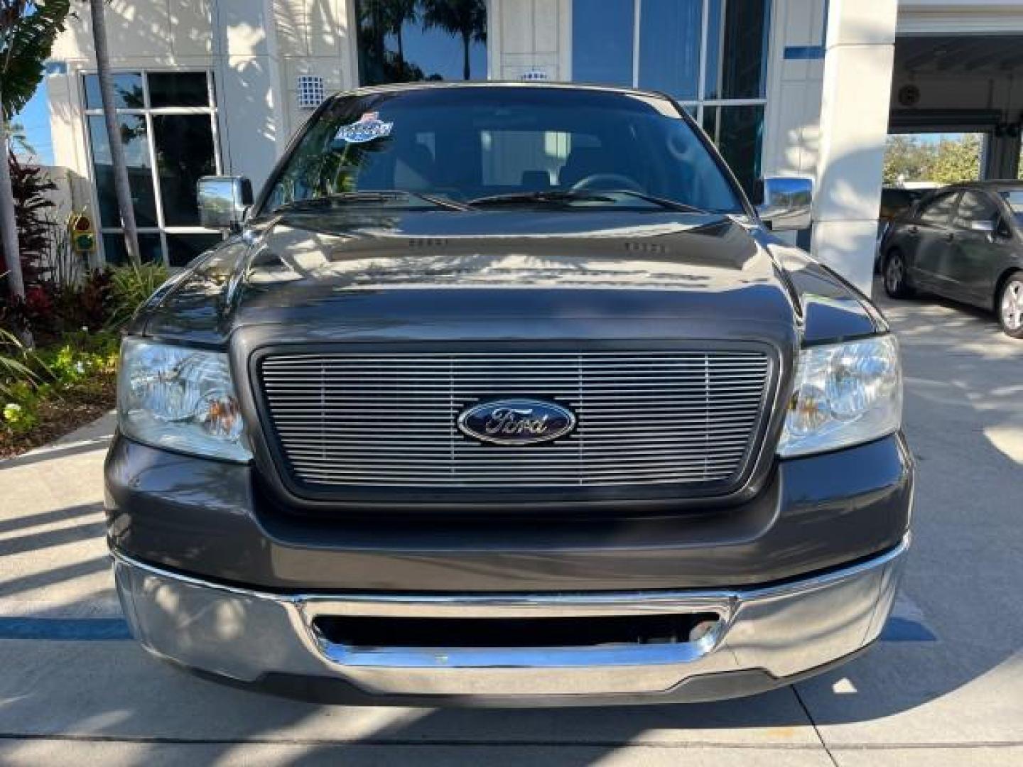 2006 Dark Shadow Grey Metallic /Flint Ford F-150 1 FL XLT CREW LOW MILES 73,628 (1FTPW12596K) with an 5.4L 3v EFI V8 Engine engine, Automatic transmission, located at 4701 North Dixie Hwy, Pompano Beach, FL, 33064, (954) 422-2889, 26.240938, -80.123474 - OUR WEBPAGE FLORIDACARS1.COM HAS OVER 100 PHOTOS AND FREE CARFAX LINK 2006 FORD F-150 XLT ROAD READY 5.4L V8 VIN: 1FTPW12596KA93531 NO RECALLS 5.6FT BED CREW PICKUP 1 OWNER FLORIDA 5.4L V8 F SOHC LOW MILES 73,628 GASOLINE 23 SERVICE RECORDS U REAR WHEEL DRIVE POWER MIRRORS Anti-Theft System Cruise C - Photo#82