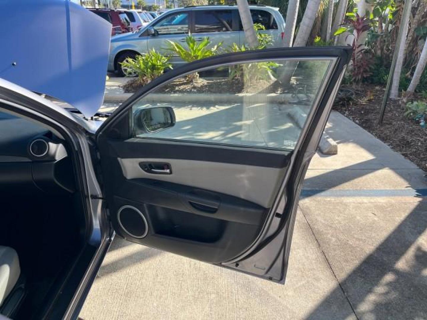 2005 Titanium Gray Metallic /Black Mazda Mazda3 s SUNROOF LOW MILES 43,509 (JM1BK323951) with an 2.3L DOHC MPFI 16-Valve 4-Cyl Engine engine, Automatic transmission, located at 4701 North Dixie Hwy, Pompano Beach, FL, 33064, (954) 422-2889, 26.240938, -80.123474 - OUR WEBPAGE FLORIDACARS1.COM HAS OVER 100 PHOTOS AND FREE CARFAX LINK 2005 MAZDA MAZDA3 S ROAD READY 2.3L I4 VIN: JM1BK323951253248 NO ACCIDENTS 29 MPG SEDAN 4 DR NO RECALLS 1 OWNER 2.3L I4 F DOHC 16V LOW MILES 43,509 GASOLINE POWER SUNROOF LEATHER FRONT WHEEL DRIVE 26 SERVICE RECORDS Alloy Wheels A - Photo#11