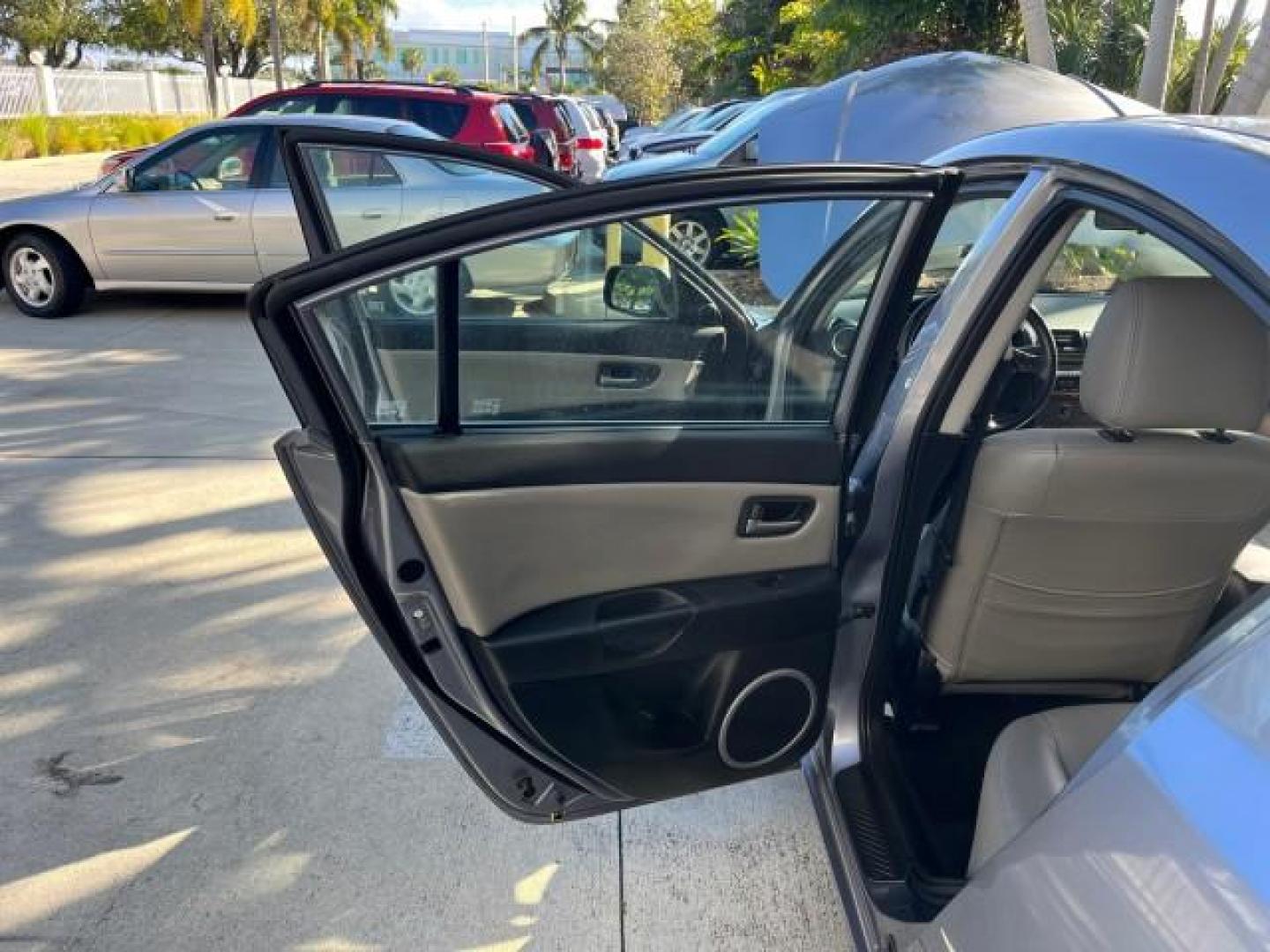 2005 Titanium Gray Metallic /Black Mazda Mazda3 s SUNROOF LOW MILES 43,509 (JM1BK323951) with an 2.3L DOHC MPFI 16-Valve 4-Cyl Engine engine, Automatic transmission, located at 4701 North Dixie Hwy, Pompano Beach, FL, 33064, (954) 422-2889, 26.240938, -80.123474 - OUR WEBPAGE FLORIDACARS1.COM HAS OVER 100 PHOTOS AND FREE CARFAX LINK 2005 MAZDA MAZDA3 S ROAD READY 2.3L I4 VIN: JM1BK323951253248 NO ACCIDENTS 29 MPG SEDAN 4 DR NO RECALLS 1 OWNER 2.3L I4 F DOHC 16V LOW MILES 43,509 GASOLINE POWER SUNROOF LEATHER FRONT WHEEL DRIVE 26 SERVICE RECORDS Alloy Wheels A - Photo#13