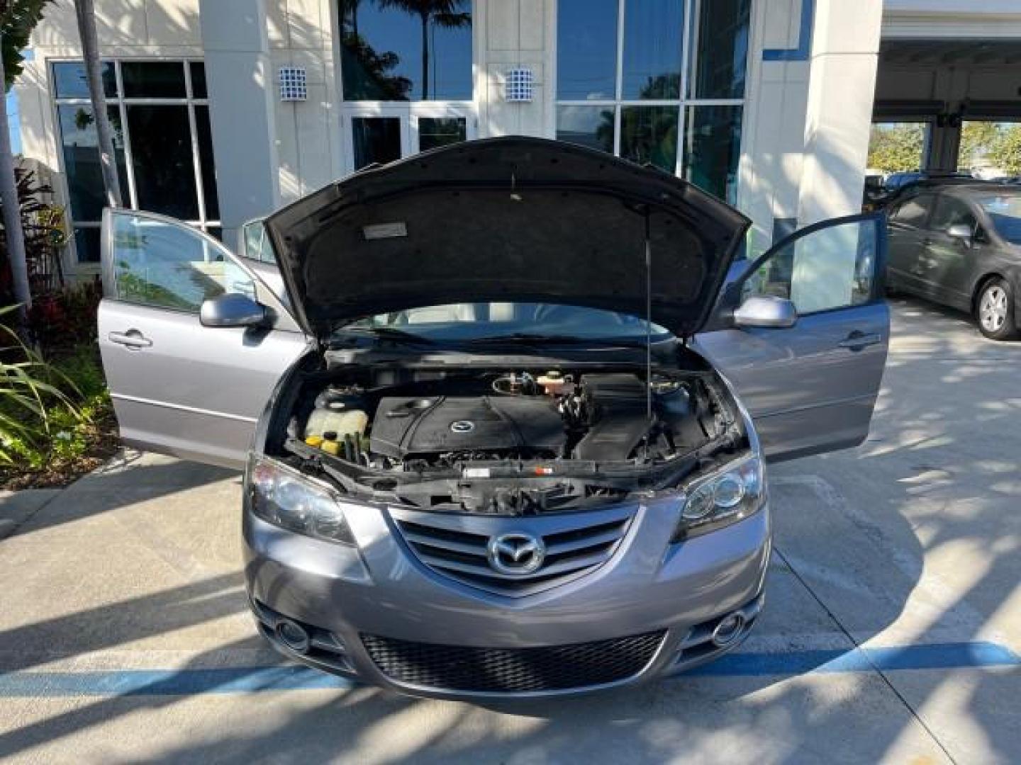 2005 Titanium Gray Metallic /Black Mazda Mazda3 s SUNROOF LOW MILES 43,509 (JM1BK323951) with an 2.3L DOHC MPFI 16-Valve 4-Cyl Engine engine, Automatic transmission, located at 4701 North Dixie Hwy, Pompano Beach, FL, 33064, (954) 422-2889, 26.240938, -80.123474 - OUR WEBPAGE FLORIDACARS1.COM HAS OVER 100 PHOTOS AND FREE CARFAX LINK 2005 MAZDA MAZDA3 S ROAD READY 2.3L I4 VIN: JM1BK323951253248 NO ACCIDENTS 29 MPG SEDAN 4 DR NO RECALLS 1 OWNER 2.3L I4 F DOHC 16V LOW MILES 43,509 GASOLINE POWER SUNROOF LEATHER FRONT WHEEL DRIVE 26 SERVICE RECORDS Alloy Wheels A - Photo#16