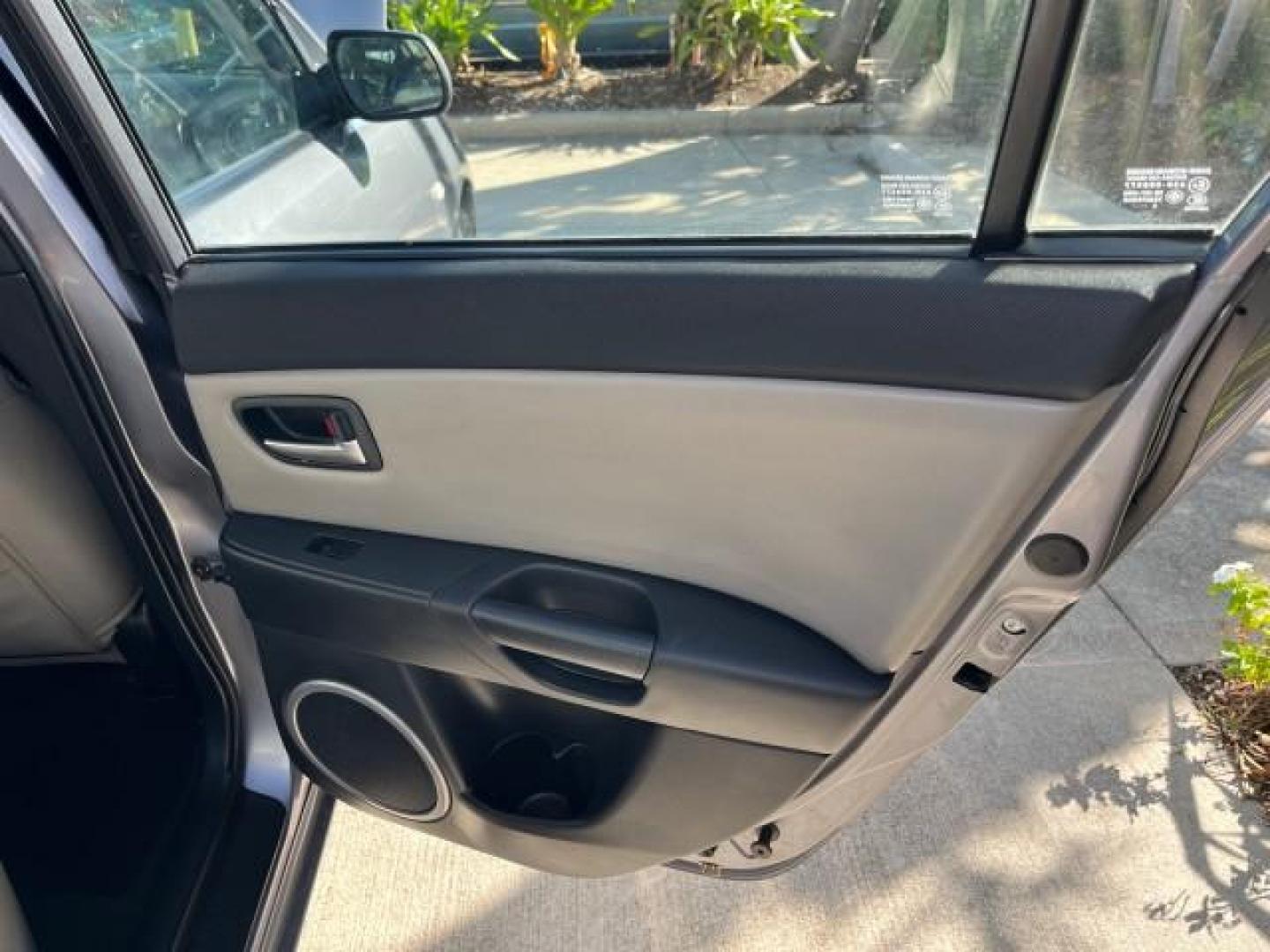 2005 Titanium Gray Metallic /Black Mazda Mazda3 s SUNROOF LOW MILES 43,509 (JM1BK323951) with an 2.3L DOHC MPFI 16-Valve 4-Cyl Engine engine, Automatic transmission, located at 4701 North Dixie Hwy, Pompano Beach, FL, 33064, (954) 422-2889, 26.240938, -80.123474 - OUR WEBPAGE FLORIDACARS1.COM HAS OVER 100 PHOTOS AND FREE CARFAX LINK 2005 MAZDA MAZDA3 S ROAD READY 2.3L I4 VIN: JM1BK323951253248 NO ACCIDENTS 29 MPG SEDAN 4 DR NO RECALLS 1 OWNER 2.3L I4 F DOHC 16V LOW MILES 43,509 GASOLINE POWER SUNROOF LEATHER FRONT WHEEL DRIVE 26 SERVICE RECORDS Alloy Wheels A - Photo#29