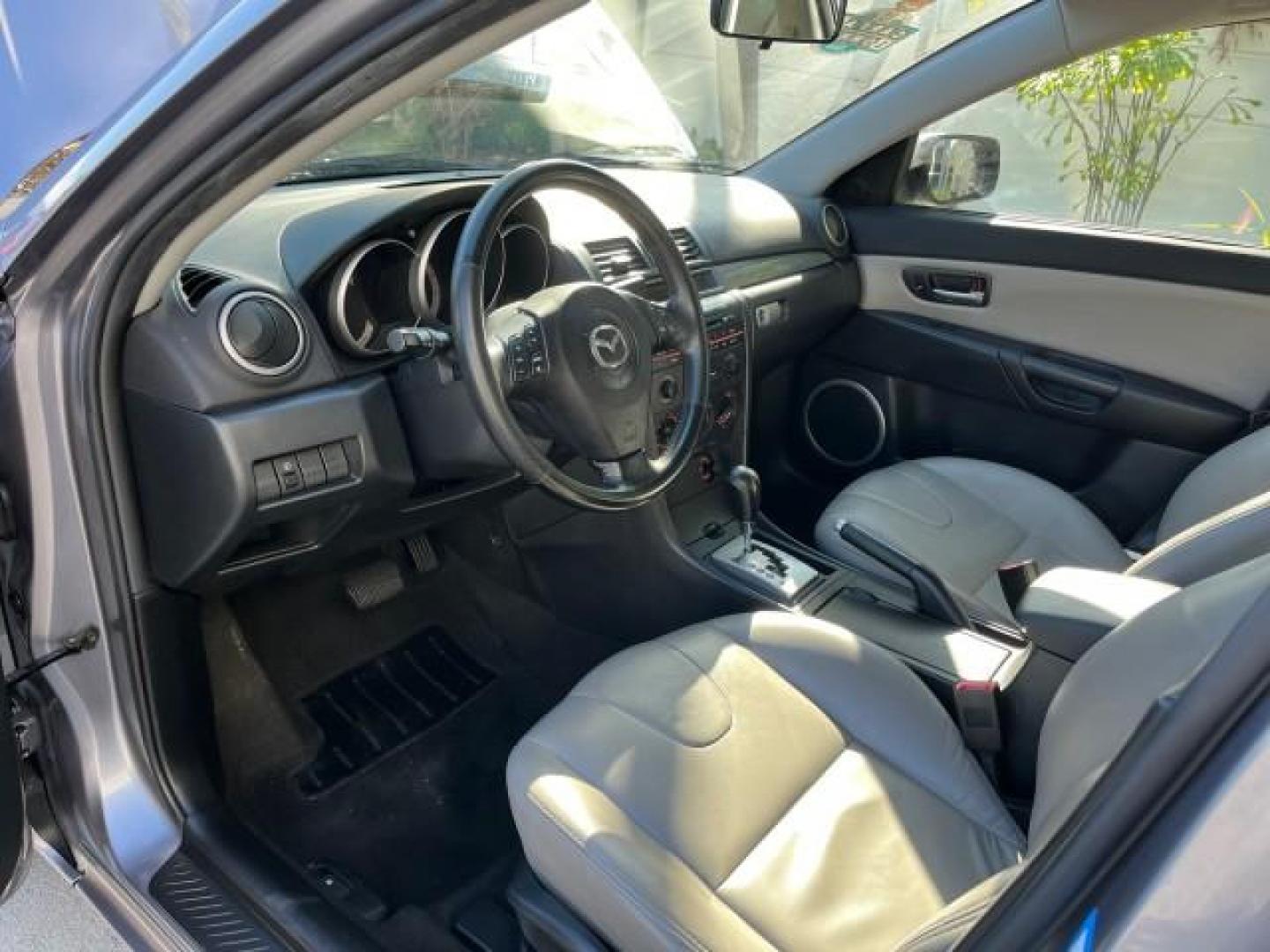 2005 Titanium Gray Metallic /Black Mazda Mazda3 s SUNROOF LOW MILES 43,509 (JM1BK323951) with an 2.3L DOHC MPFI 16-Valve 4-Cyl Engine engine, Automatic transmission, located at 4701 North Dixie Hwy, Pompano Beach, FL, 33064, (954) 422-2889, 26.240938, -80.123474 - OUR WEBPAGE FLORIDACARS1.COM HAS OVER 100 PHOTOS AND FREE CARFAX LINK 2005 MAZDA MAZDA3 S ROAD READY 2.3L I4 VIN: JM1BK323951253248 NO ACCIDENTS 29 MPG SEDAN 4 DR NO RECALLS 1 OWNER 2.3L I4 F DOHC 16V LOW MILES 43,509 GASOLINE POWER SUNROOF LEATHER FRONT WHEEL DRIVE 26 SERVICE RECORDS Alloy Wheels A - Photo#43