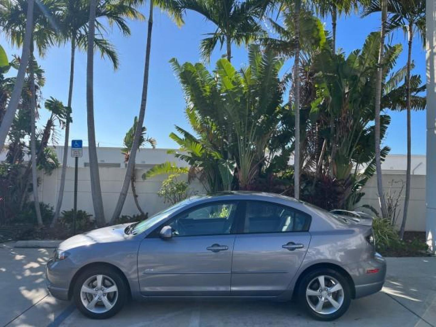 2005 Titanium Gray Metallic /Black Mazda Mazda3 s SUNROOF LOW MILES 43,509 (JM1BK323951) with an 2.3L DOHC MPFI 16-Valve 4-Cyl Engine engine, Automatic transmission, located at 4701 North Dixie Hwy, Pompano Beach, FL, 33064, (954) 422-2889, 26.240938, -80.123474 - OUR WEBPAGE FLORIDACARS1.COM HAS OVER 100 PHOTOS AND FREE CARFAX LINK 2005 MAZDA MAZDA3 S ROAD READY 2.3L I4 VIN: JM1BK323951253248 NO ACCIDENTS 29 MPG SEDAN 4 DR NO RECALLS 1 OWNER 2.3L I4 F DOHC 16V LOW MILES 43,509 GASOLINE POWER SUNROOF LEATHER FRONT WHEEL DRIVE 26 SERVICE RECORDS Alloy Wheels A - Photo#4