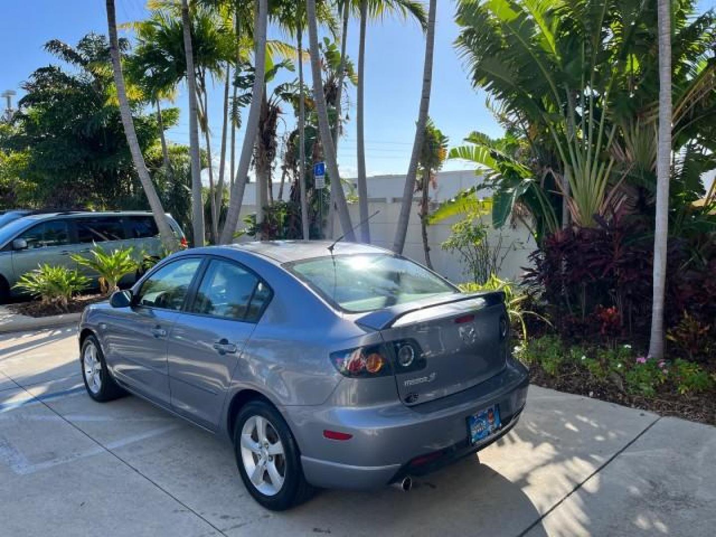 2005 Titanium Gray Metallic /Black Mazda Mazda3 s SUNROOF LOW MILES 43,509 (JM1BK323951) with an 2.3L DOHC MPFI 16-Valve 4-Cyl Engine engine, Automatic transmission, located at 4701 North Dixie Hwy, Pompano Beach, FL, 33064, (954) 422-2889, 26.240938, -80.123474 - OUR WEBPAGE FLORIDACARS1.COM HAS OVER 100 PHOTOS AND FREE CARFAX LINK 2005 MAZDA MAZDA3 S ROAD READY 2.3L I4 VIN: JM1BK323951253248 NO ACCIDENTS 29 MPG SEDAN 4 DR NO RECALLS 1 OWNER 2.3L I4 F DOHC 16V LOW MILES 43,509 GASOLINE POWER SUNROOF LEATHER FRONT WHEEL DRIVE 26 SERVICE RECORDS Alloy Wheels A - Photo#5