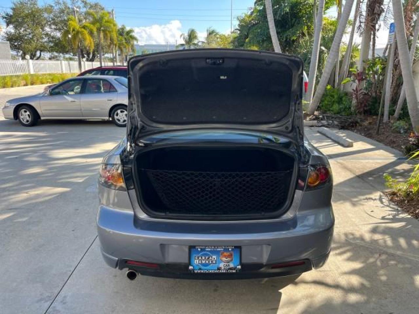 2005 Titanium Gray Metallic /Black Mazda Mazda3 s SUNROOF LOW MILES 43,509 (JM1BK323951) with an 2.3L DOHC MPFI 16-Valve 4-Cyl Engine engine, Automatic transmission, located at 4701 North Dixie Hwy, Pompano Beach, FL, 33064, (954) 422-2889, 26.240938, -80.123474 - OUR WEBPAGE FLORIDACARS1.COM HAS OVER 100 PHOTOS AND FREE CARFAX LINK 2005 MAZDA MAZDA3 S ROAD READY 2.3L I4 VIN: JM1BK323951253248 NO ACCIDENTS 29 MPG SEDAN 4 DR NO RECALLS 1 OWNER 2.3L I4 F DOHC 16V LOW MILES 43,509 GASOLINE POWER SUNROOF LEATHER FRONT WHEEL DRIVE 26 SERVICE RECORDS Alloy Wheels A - Photo#68