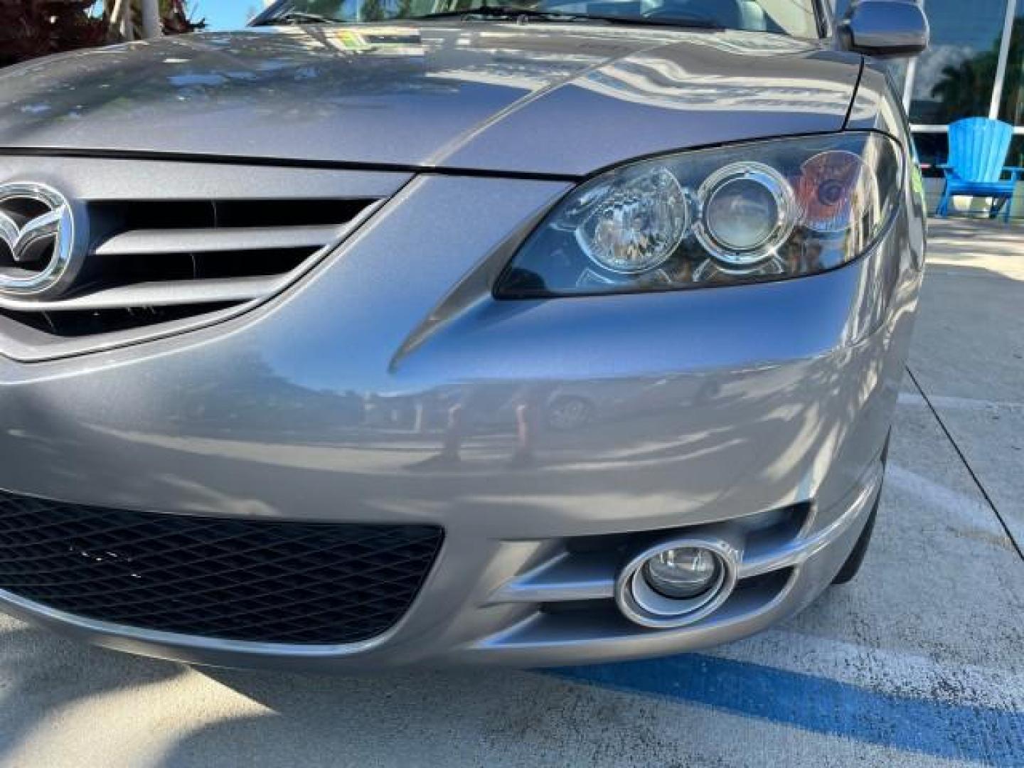 2005 Titanium Gray Metallic /Black Mazda Mazda3 s SUNROOF LOW MILES 43,509 (JM1BK323951) with an 2.3L DOHC MPFI 16-Valve 4-Cyl Engine engine, Automatic transmission, located at 4701 North Dixie Hwy, Pompano Beach, FL, 33064, (954) 422-2889, 26.240938, -80.123474 - OUR WEBPAGE FLORIDACARS1.COM HAS OVER 100 PHOTOS AND FREE CARFAX LINK 2005 MAZDA MAZDA3 S ROAD READY 2.3L I4 VIN: JM1BK323951253248 NO ACCIDENTS 29 MPG SEDAN 4 DR NO RECALLS 1 OWNER 2.3L I4 F DOHC 16V LOW MILES 43,509 GASOLINE POWER SUNROOF LEATHER FRONT WHEEL DRIVE 26 SERVICE RECORDS Alloy Wheels A - Photo#85