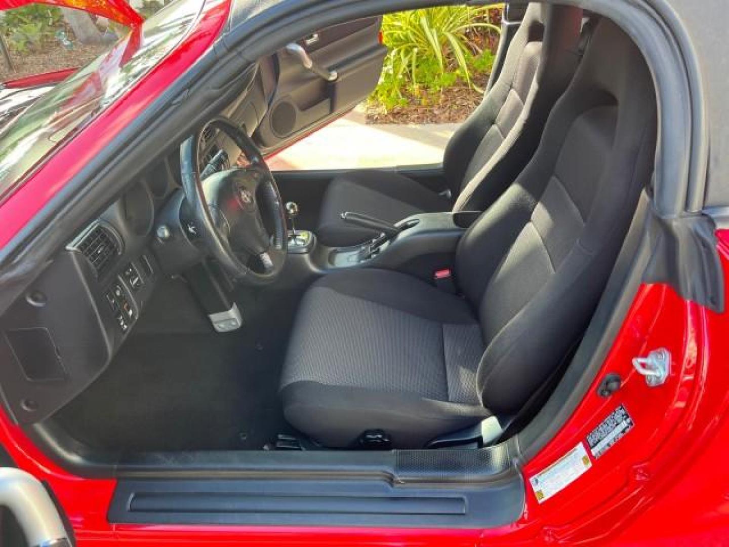 2004 Absolutely Red /Gray Toyota MR2 Spyder 1 FL LOW MILES 6,855 (JTDFR320140) with an 1.8L DOHC MPFI VVT-i 16-Valve 4-Cyl Engine engine, Automatic transmission, located at 4701 North Dixie Hwy, Pompano Beach, FL, 33064, (954) 422-2889, 26.240938, -80.123474 - OUR WEBPAGE FLORIDACARS1.COM HAS OVER 100 PHOTOS AND FREE CARFAX LINK 2004 TOYOTA MR2 SPYDER AUTO ROAD READY 1.8L I4 VIN: JTDFR320140068103 NO ACCIDENTS 33 MPG CONVERTIBLE NO RECALLS 1.8L I4 F DOHC 16V 1 OWNER FLORIDA GASOLINE ONLY 6,855 MILES REAR WHEEL DRIVE CONVERTIBLE TOP Alloy Wheels Approach L - Photo#11