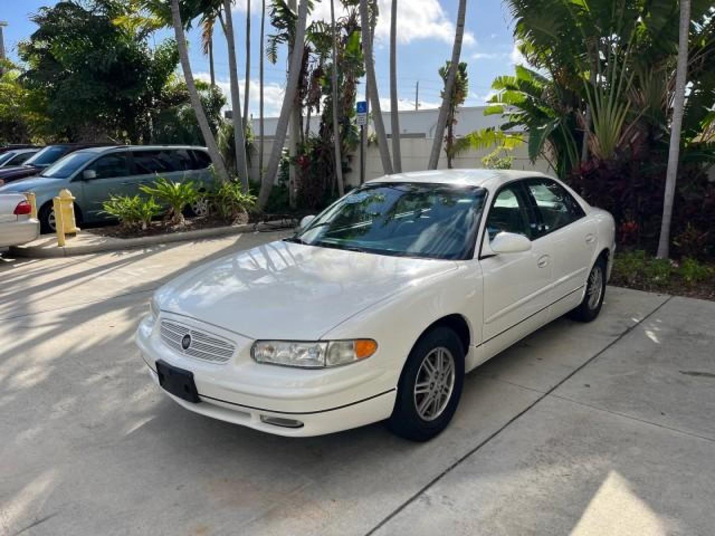 2003 White /Taupe Buick Regal LS LOW MILES 73,246 (2G4WB52K031) with an 3.8L 3800 V6 SFI Engine engine, Automatic transmission, located at 4701 North Dixie Hwy, Pompano Beach, FL, 33064, (954) 422-2889, 26.240938, -80.123474 - OUR WEBPAGE FLORIDACARS1.COM HAS OVER 100 PHOTOS AND FREE CARFAX LINK 2003 BUICK REGAL LS ROAD READY 3.8L V6 VIN: 2G4WB52K031174686 NO ACCIDENTS 29 MPG SEDAN 4 DR LOW MILES 73,246 3.8L V6 F 12V THE BEST POWER LEATHER SEATS GASOLINE 8 SERVICE RECORDS FRONT WHEEL DRIVE POWER MIRRORS DUAL AC Anti-Theft - Photo#3