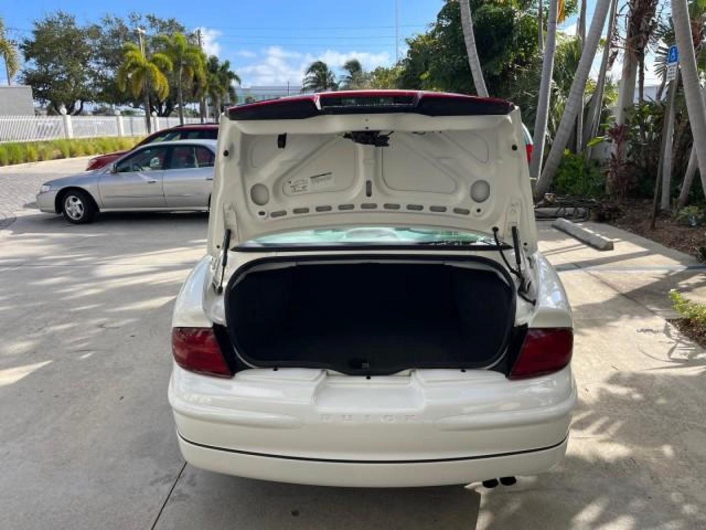 2003 White /Taupe Buick Regal LS LOW MILES 73,246 (2G4WB52K031) with an 3.8L 3800 V6 SFI Engine engine, Automatic transmission, located at 4701 North Dixie Hwy, Pompano Beach, FL, 33064, (954) 422-2889, 26.240938, -80.123474 - OUR WEBPAGE FLORIDACARS1.COM HAS OVER 100 PHOTOS AND FREE CARFAX LINK 2003 BUICK REGAL LS ROAD READY 3.8L V6 VIN: 2G4WB52K031174686 NO ACCIDENTS 29 MPG SEDAN 4 DR LOW MILES 73,246 3.8L V6 F 12V THE BEST POWER LEATHER SEATS GASOLINE 8 SERVICE RECORDS FRONT WHEEL DRIVE POWER MIRRORS DUAL AC Anti-Theft - Photo#62