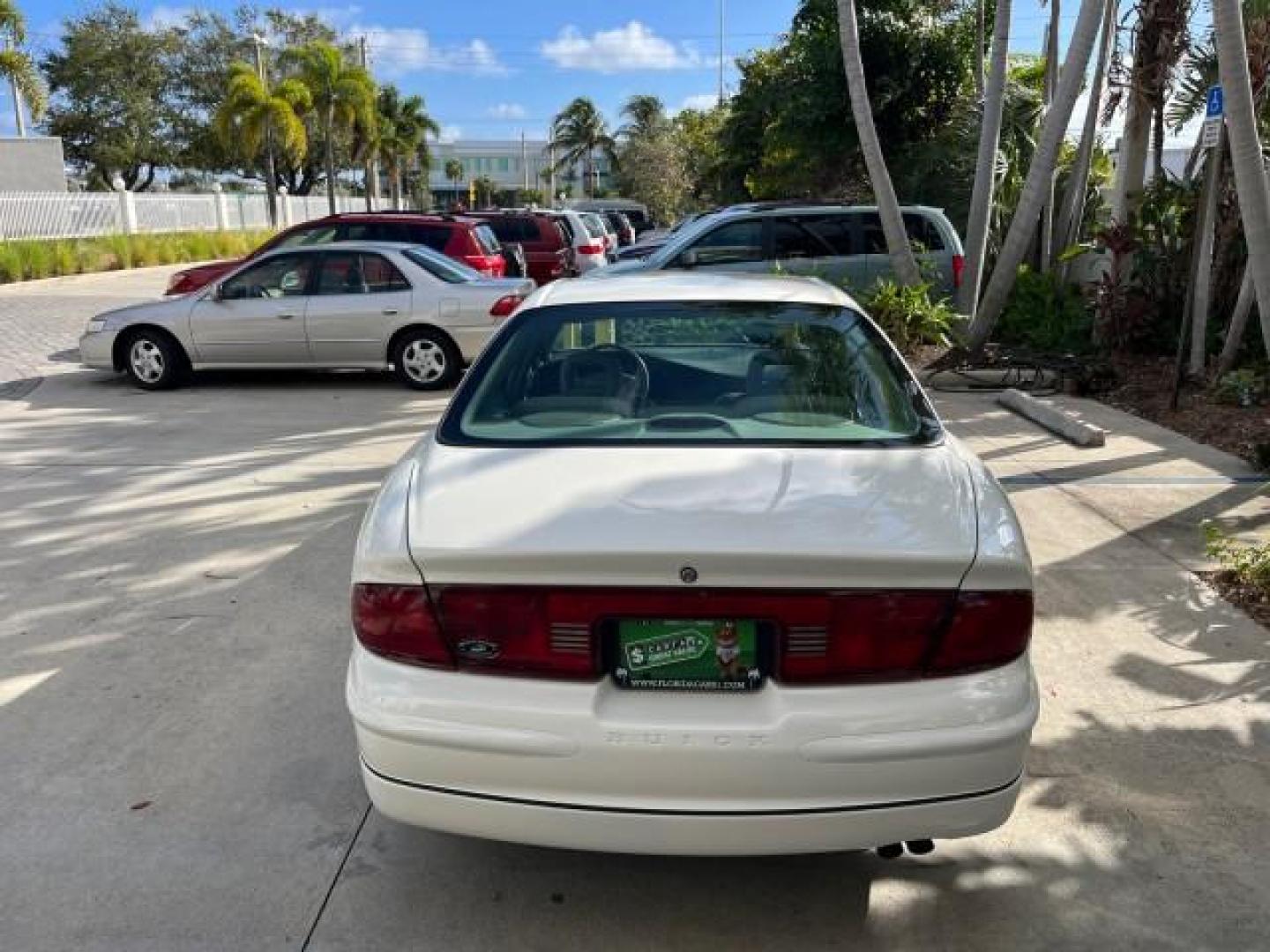 2003 White /Taupe Buick Regal LS LOW MILES 73,246 (2G4WB52K031) with an 3.8L 3800 V6 SFI Engine engine, Automatic transmission, located at 4701 North Dixie Hwy, Pompano Beach, FL, 33064, (954) 422-2889, 26.240938, -80.123474 - OUR WEBPAGE FLORIDACARS1.COM HAS OVER 100 PHOTOS AND FREE CARFAX LINK 2003 BUICK REGAL LS ROAD READY 3.8L V6 VIN: 2G4WB52K031174686 NO ACCIDENTS 29 MPG SEDAN 4 DR LOW MILES 73,246 3.8L V6 F 12V THE BEST POWER LEATHER SEATS GASOLINE 8 SERVICE RECORDS FRONT WHEEL DRIVE POWER MIRRORS DUAL AC Anti-Theft - Photo#6