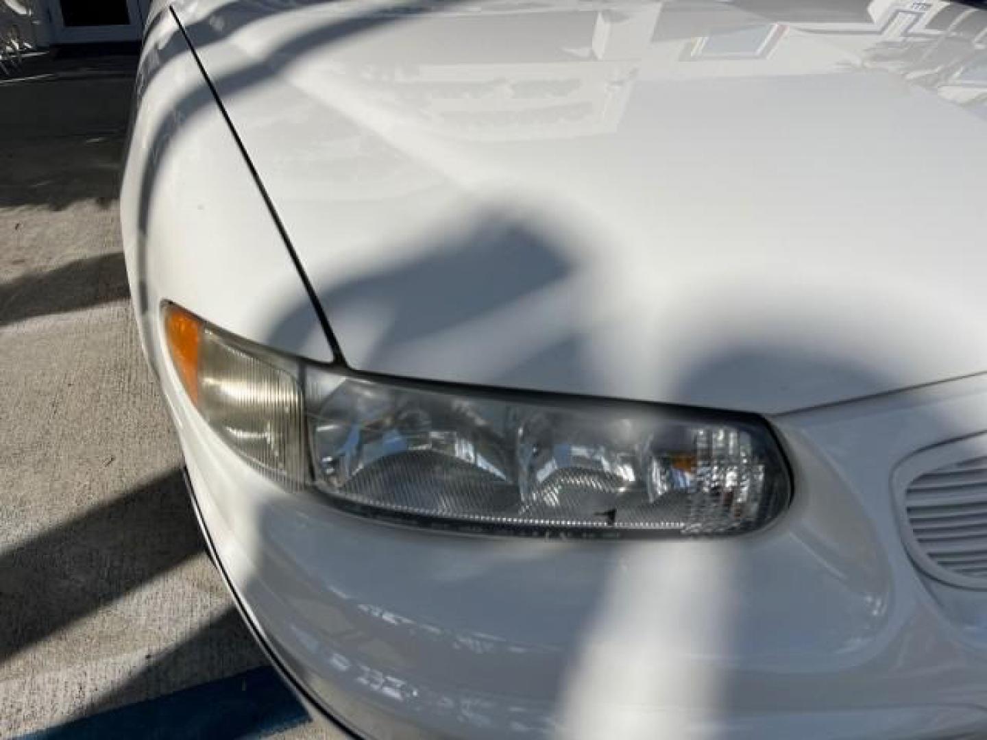 2003 White /Taupe Buick Regal LS LOW MILES 73,246 (2G4WB52K031) with an 3.8L 3800 V6 SFI Engine engine, Automatic transmission, located at 4701 North Dixie Hwy, Pompano Beach, FL, 33064, (954) 422-2889, 26.240938, -80.123474 - OUR WEBPAGE FLORIDACARS1.COM HAS OVER 100 PHOTOS AND FREE CARFAX LINK 2003 BUICK REGAL LS ROAD READY 3.8L V6 VIN: 2G4WB52K031174686 NO ACCIDENTS 29 MPG SEDAN 4 DR LOW MILES 73,246 3.8L V6 F 12V THE BEST POWER LEATHER SEATS GASOLINE 8 SERVICE RECORDS FRONT WHEEL DRIVE POWER MIRRORS DUAL AC Anti-Theft - Photo#76