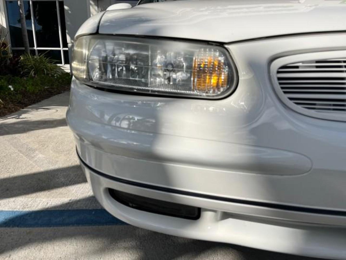 2003 White /Taupe Buick Regal LS LOW MILES 73,246 (2G4WB52K031) with an 3.8L 3800 V6 SFI Engine engine, Automatic transmission, located at 4701 North Dixie Hwy, Pompano Beach, FL, 33064, (954) 422-2889, 26.240938, -80.123474 - OUR WEBPAGE FLORIDACARS1.COM HAS OVER 100 PHOTOS AND FREE CARFAX LINK 2003 BUICK REGAL LS ROAD READY 3.8L V6 VIN: 2G4WB52K031174686 NO ACCIDENTS 29 MPG SEDAN 4 DR LOW MILES 73,246 3.8L V6 F 12V THE BEST POWER LEATHER SEATS GASOLINE 8 SERVICE RECORDS FRONT WHEEL DRIVE POWER MIRRORS DUAL AC Anti-Theft - Photo#77