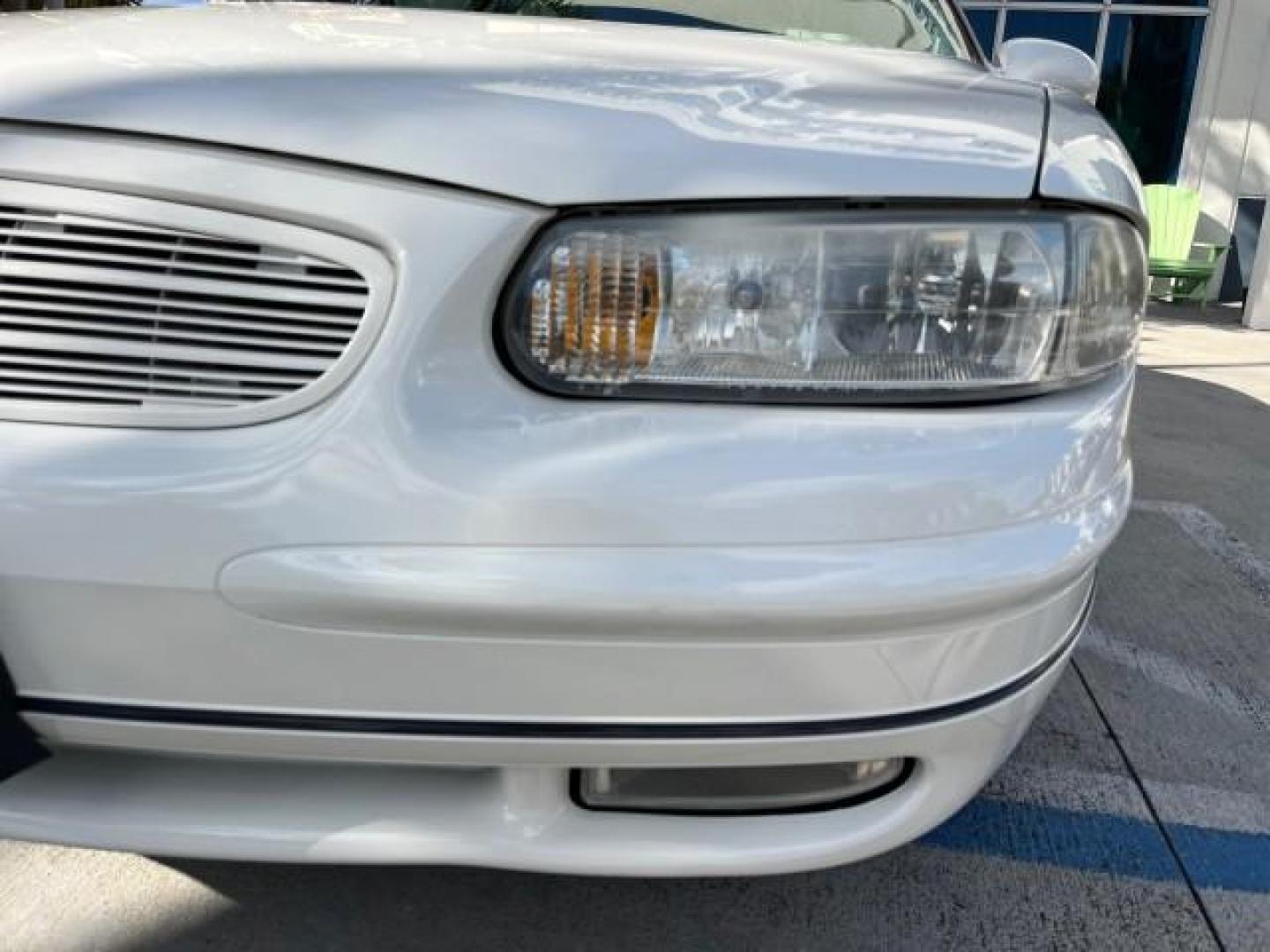 2003 White /Taupe Buick Regal LS LOW MILES 73,246 (2G4WB52K031) with an 3.8L 3800 V6 SFI Engine engine, Automatic transmission, located at 4701 North Dixie Hwy, Pompano Beach, FL, 33064, (954) 422-2889, 26.240938, -80.123474 - OUR WEBPAGE FLORIDACARS1.COM HAS OVER 100 PHOTOS AND FREE CARFAX LINK 2003 BUICK REGAL LS ROAD READY 3.8L V6 VIN: 2G4WB52K031174686 NO ACCIDENTS 29 MPG SEDAN 4 DR LOW MILES 73,246 3.8L V6 F 12V THE BEST POWER LEATHER SEATS GASOLINE 8 SERVICE RECORDS FRONT WHEEL DRIVE POWER MIRRORS DUAL AC Anti-Theft - Photo#78