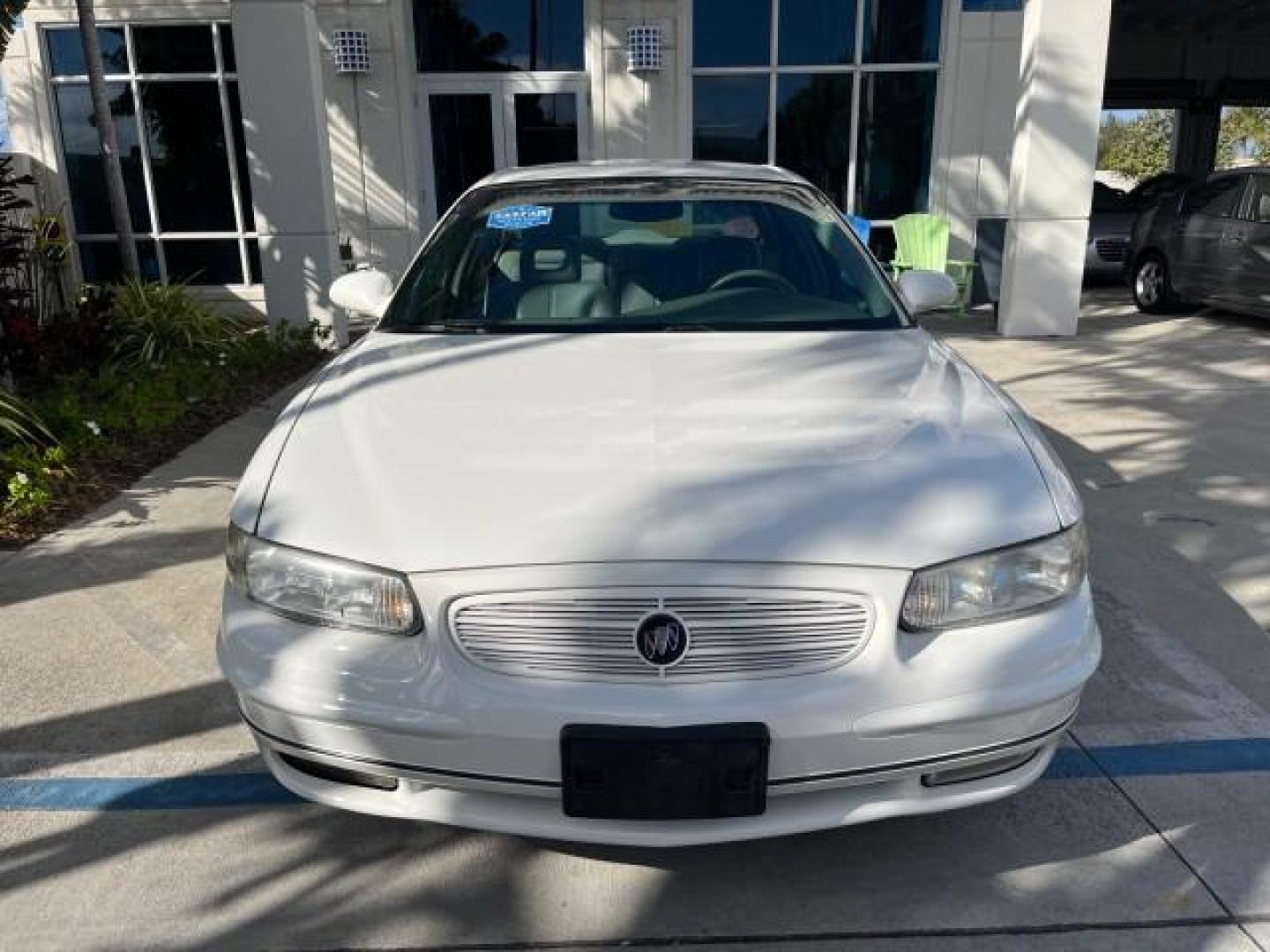 2003 White /Taupe Buick Regal LS LOW MILES 73,246 (2G4WB52K031) with an 3.8L 3800 V6 SFI Engine engine, Automatic transmission, located at 4701 North Dixie Hwy, Pompano Beach, FL, 33064, (954) 422-2889, 26.240938, -80.123474 - OUR WEBPAGE FLORIDACARS1.COM HAS OVER 100 PHOTOS AND FREE CARFAX LINK 2003 BUICK REGAL LS ROAD READY 3.8L V6 VIN: 2G4WB52K031174686 NO ACCIDENTS 29 MPG SEDAN 4 DR LOW MILES 73,246 3.8L V6 F 12V THE BEST POWER LEATHER SEATS GASOLINE 8 SERVICE RECORDS FRONT WHEEL DRIVE POWER MIRRORS DUAL AC Anti-Theft - Photo#79