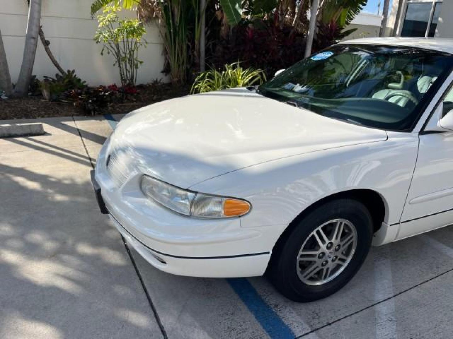 2003 White /Taupe Buick Regal LS LOW MILES 73,246 (2G4WB52K031) with an 3.8L 3800 V6 SFI Engine engine, Automatic transmission, located at 4701 North Dixie Hwy, Pompano Beach, FL, 33064, (954) 422-2889, 26.240938, -80.123474 - OUR WEBPAGE FLORIDACARS1.COM HAS OVER 100 PHOTOS AND FREE CARFAX LINK 2003 BUICK REGAL LS ROAD READY 3.8L V6 VIN: 2G4WB52K031174686 NO ACCIDENTS 29 MPG SEDAN 4 DR LOW MILES 73,246 3.8L V6 F 12V THE BEST POWER LEATHER SEATS GASOLINE 8 SERVICE RECORDS FRONT WHEEL DRIVE POWER MIRRORS DUAL AC Anti-Theft - Photo#82